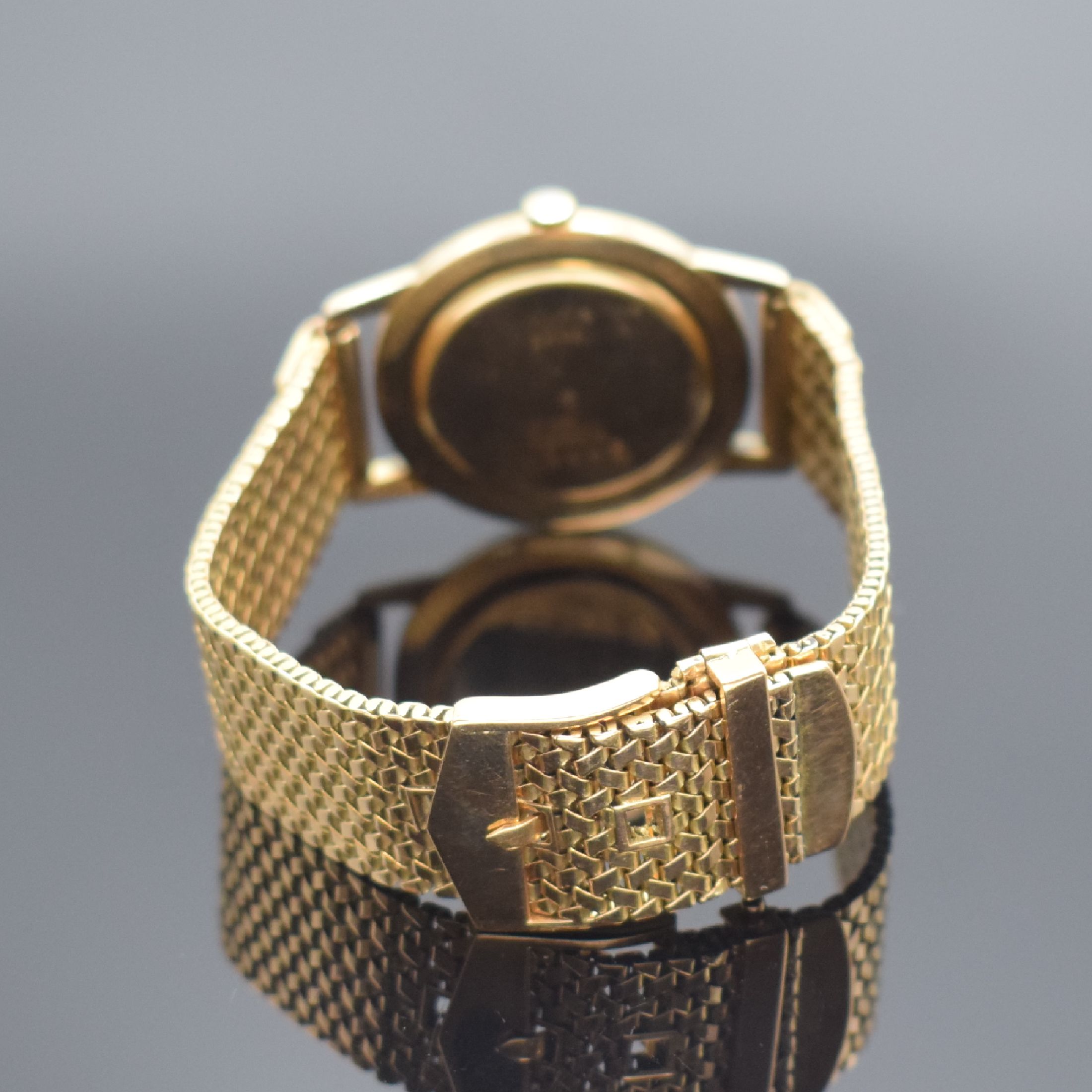 Detail b: RADO Herrenarmbanduhr in RG 585/000 an RG 750/000 Band, Handaufzug, Schweiz um 1960, einschaliges Geh., Glasrand aufgedr., silb. Zifferbl. m. aufgel. ...
