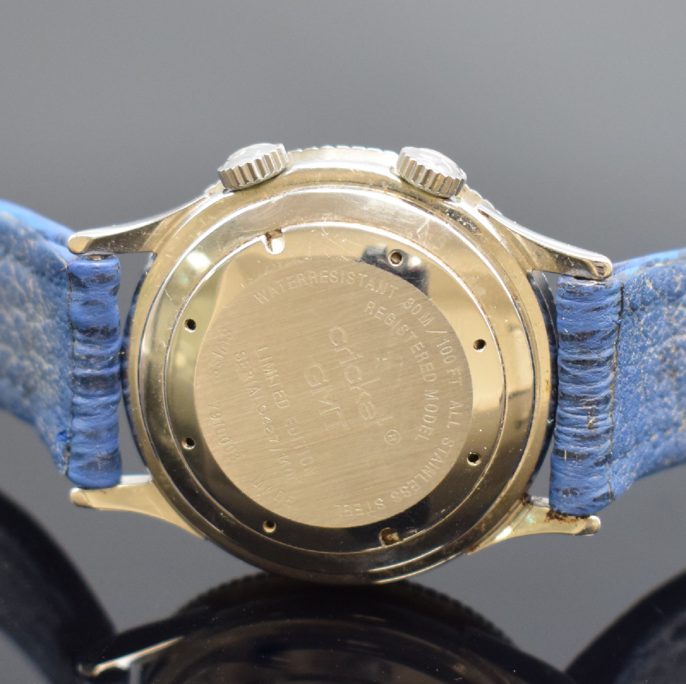 Detail d: REVUE THOMMEN auf 1400 Stück limitierter Armbandwecker Serie Cricket GMT Referenz 7910003, Handaufzug, Edelstahlgeh. inkl. Lederband m. orig. ...