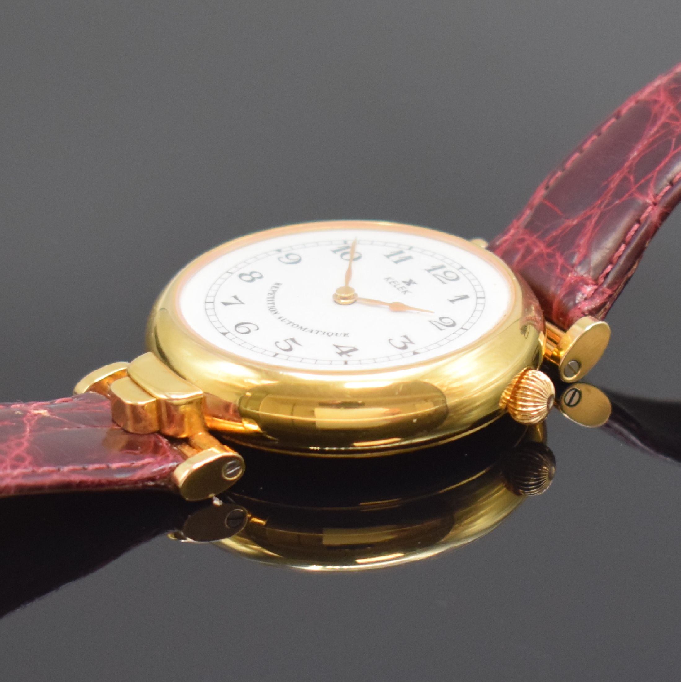 Detail b: KELEK Herrenarmbanduhr mit 5- Minutenrepetition Referenz DK 87-211 A, Schweiz 1990er Jahre, Automatik, verg., beids. vergl. Gehäuse, orig. Lederband ...