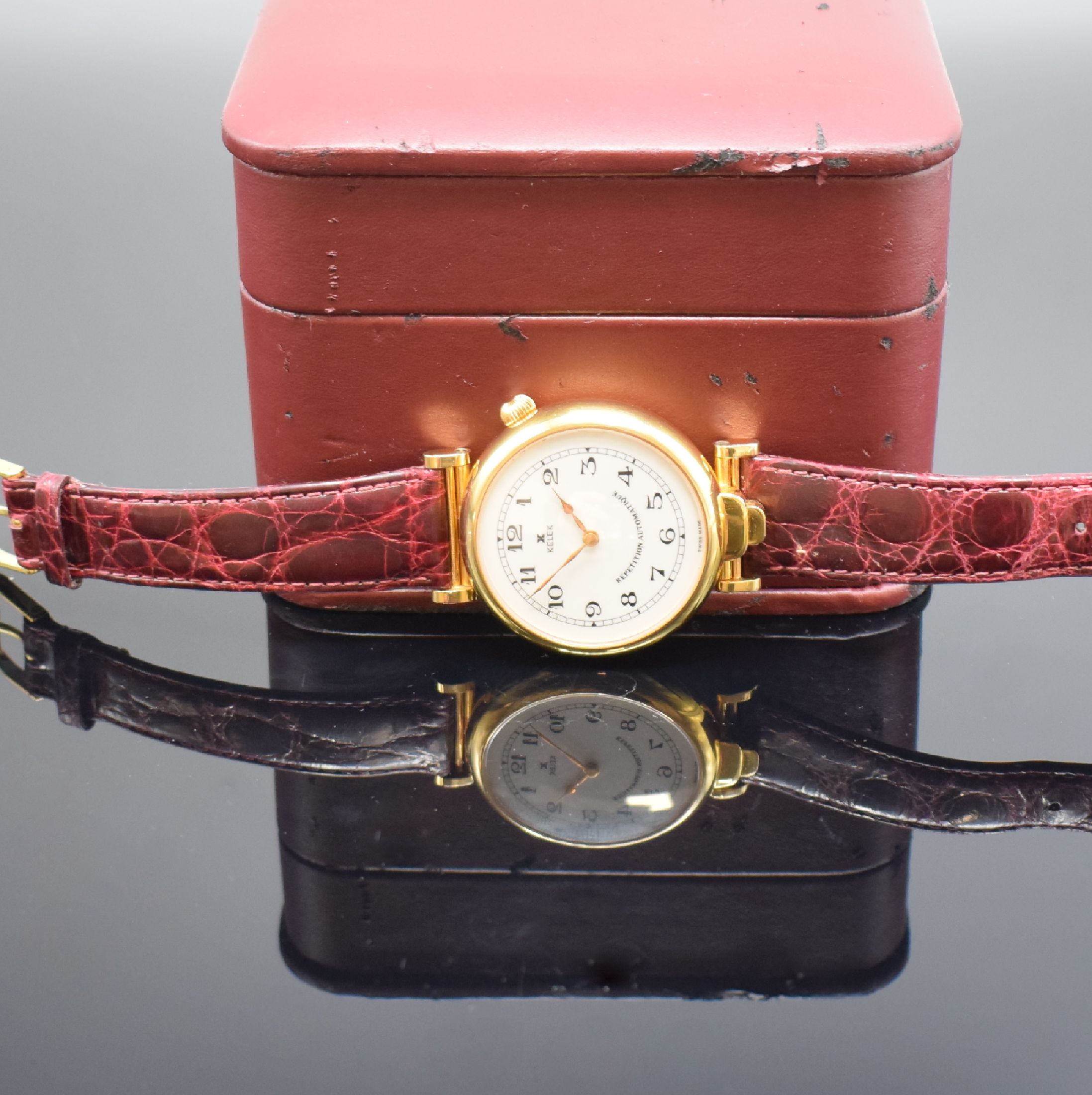 Detail e: KELEK Herrenarmbanduhr mit 5- Minutenrepetition Referenz DK 87-211 A, Schweiz 1990er Jahre, Automatik, verg., beids. vergl. Gehäuse, orig. Lederband ...