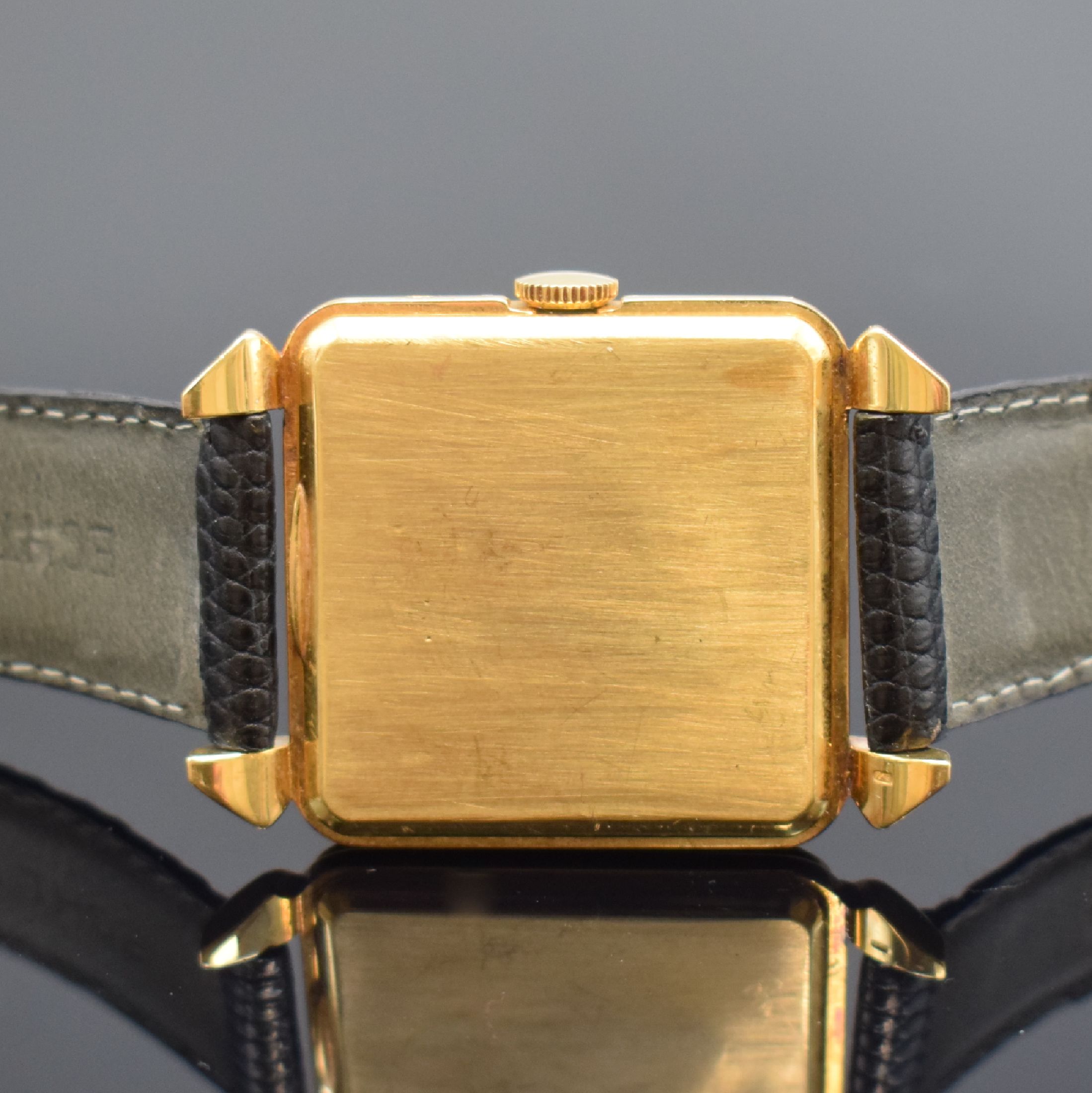 Detail e: OMEGA quadratische Herrenarmbanduhr mit Hammerautomatik in GG 750/000, Schweiz um 1950, Automatik, gedr. Geh., Boden dell., Lederband m. orig. Omega ...