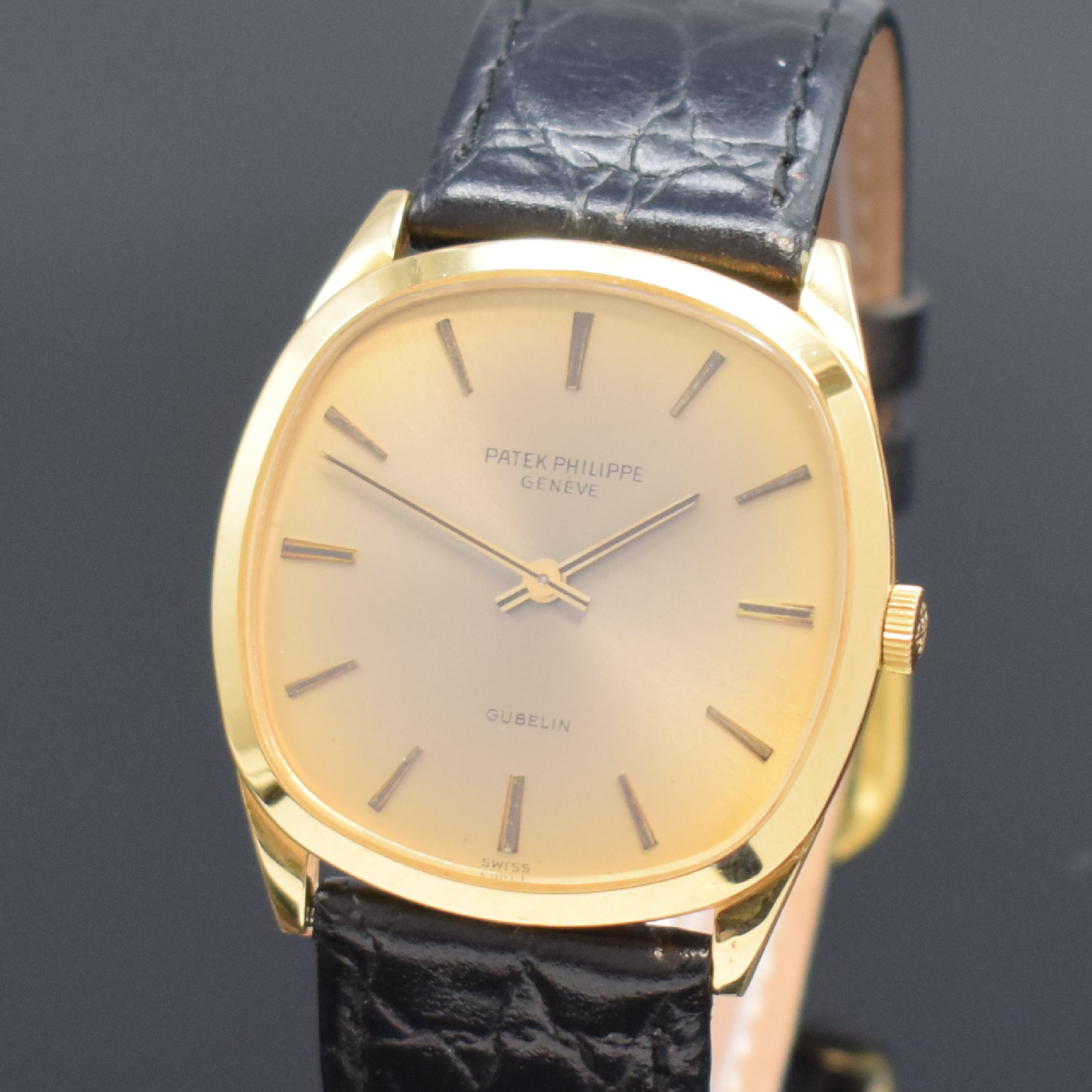 Detail a: PATEK PHILIPPE Gübelin Herrenarmbanduhr in GG 750/000 Referenz 3544, Schweiz um 1960, Handaufzug, Boden aufgedr., gold. Zifferbl. m. aufges. ...