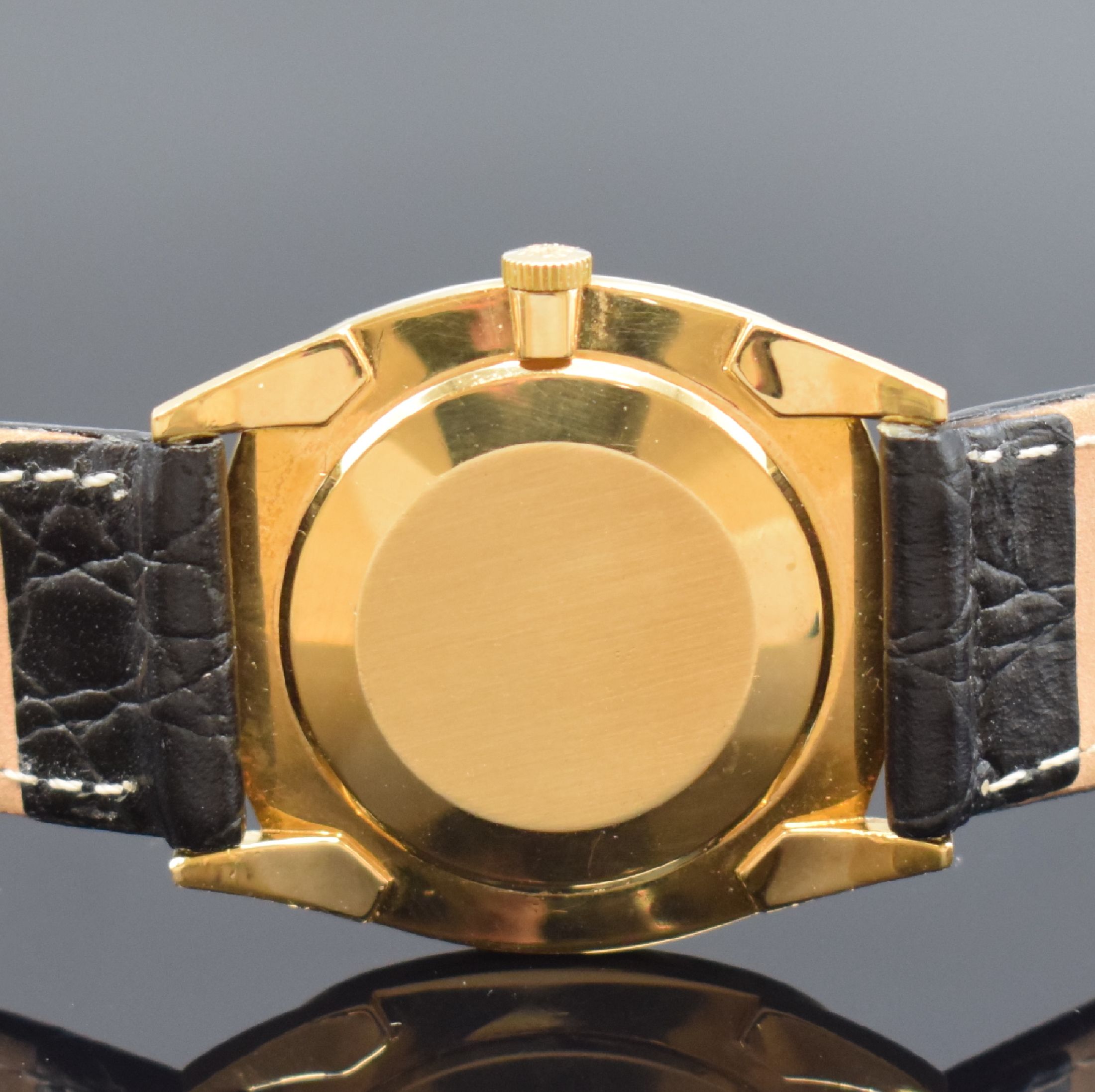 Detail d: PATEK PHILIPPE Gübelin Herrenarmbanduhr in GG 750/000 Referenz 3544, Schweiz um 1960, Handaufzug, Boden aufgedr., gold. Zifferbl. m. aufges. ...