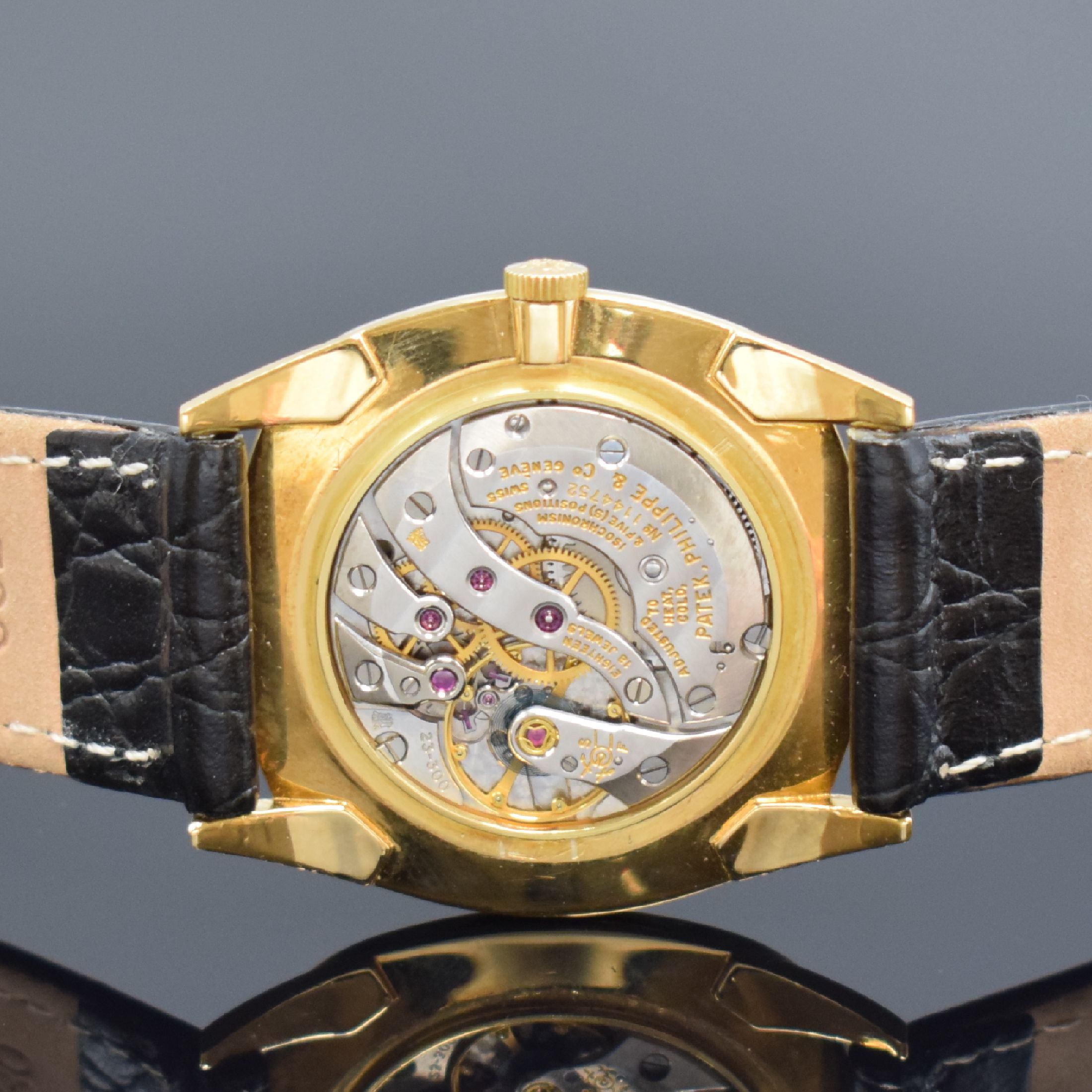 Detail e: PATEK PHILIPPE Gübelin Herrenarmbanduhr in GG 750/000 Referenz 3544, Schweiz um 1960, Handaufzug, Boden aufgedr., gold. Zifferbl. m. aufges. ...