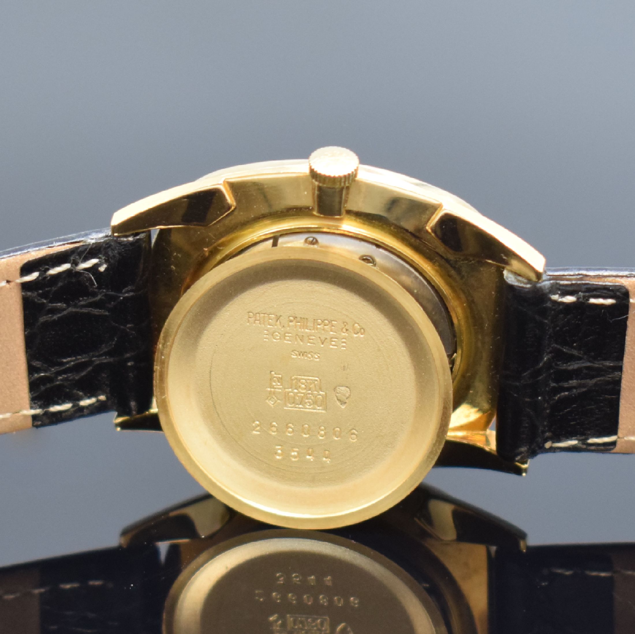Detail f: PATEK PHILIPPE Gübelin Herrenarmbanduhr in GG 750/000 Referenz 3544, Schweiz um 1960, Handaufzug, Boden aufgedr., gold. Zifferbl. m. aufges. ...