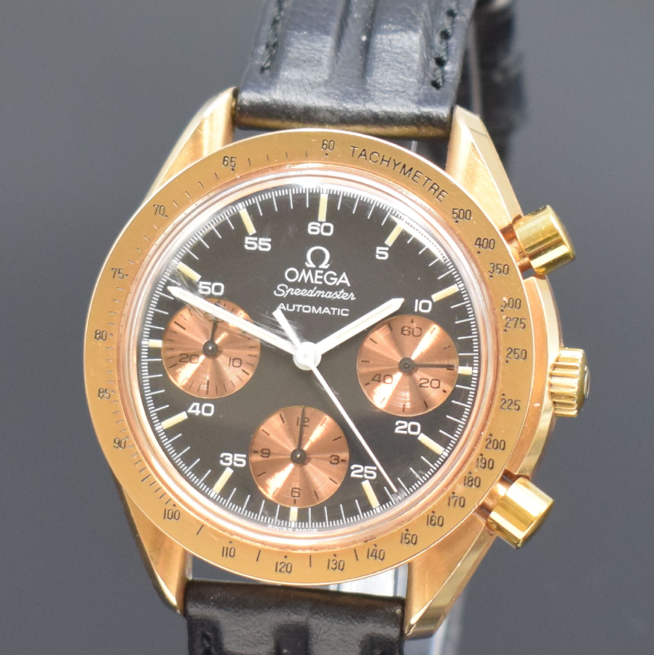 Detail a: OMEGA Speedmaster Herrenarmbanduhr mit Chronograph in RG 750/000 Referenz 1750033, Schweiz um 1995, Automatik, 2-teil. Gehäuse, Boden aufgedr., ...