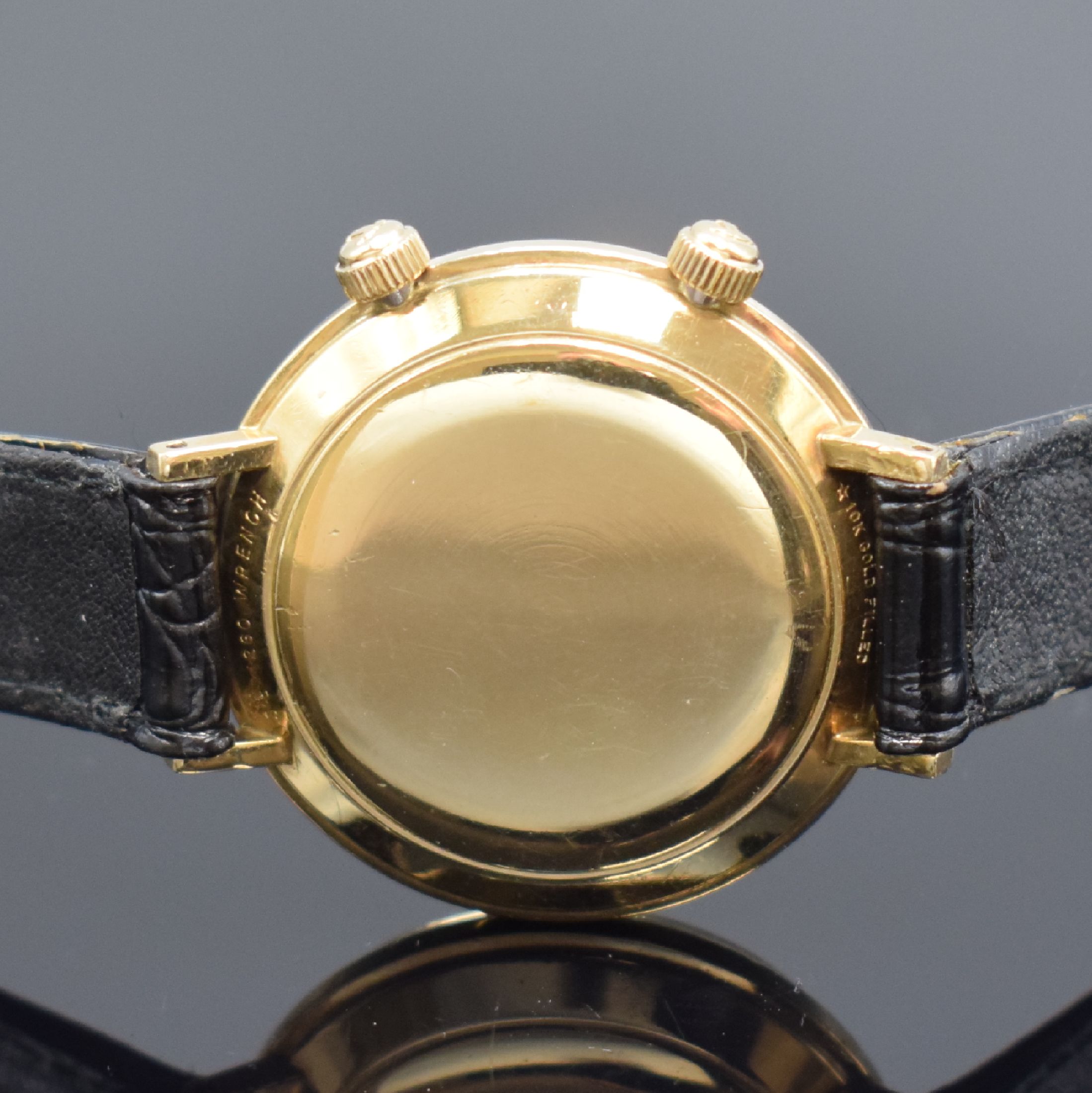 Detail c: LeCoultre Memovox Herrenarmbanduhr mit Wecker, Schweiz f. US-Markt um 1955, Handaufzug, 10K gold filled Monocoque-Geh., silb. Zifferbl. m. aufges. ...