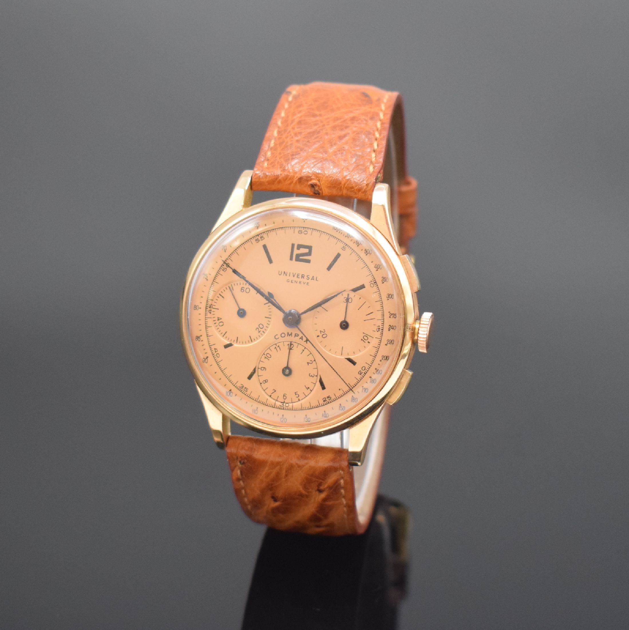 UNIVERSAL GENEVE Compax Schaltradchronograph in RG 750/000, Schweiz um 1945, Handaufzug, Boden und Glasrand aufgedr., kupferfarb. Zifferbl. rest., ...