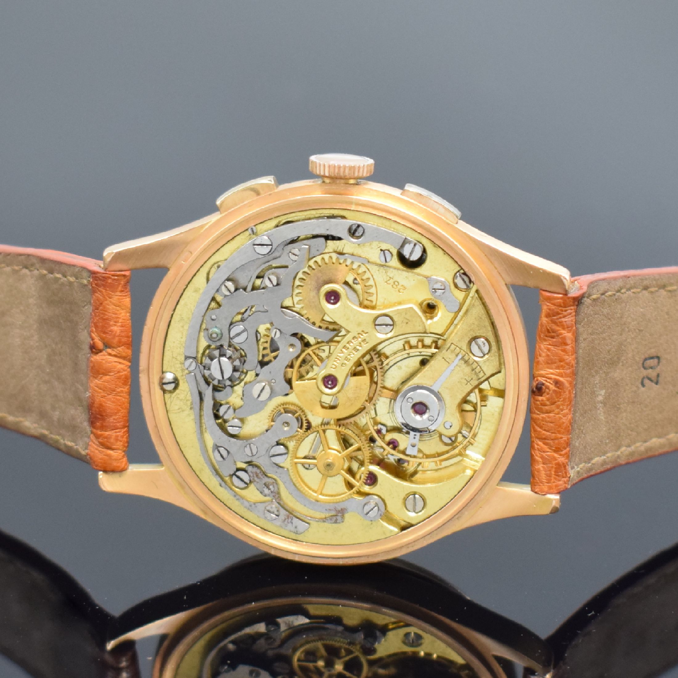 Detail e: UNIVERSAL GENEVE Compax Schaltradchronograph in RG 750/000, Schweiz um 1945, Handaufzug, Boden und Glasrand aufgedr., kupferfarb. Zifferbl. rest., ...