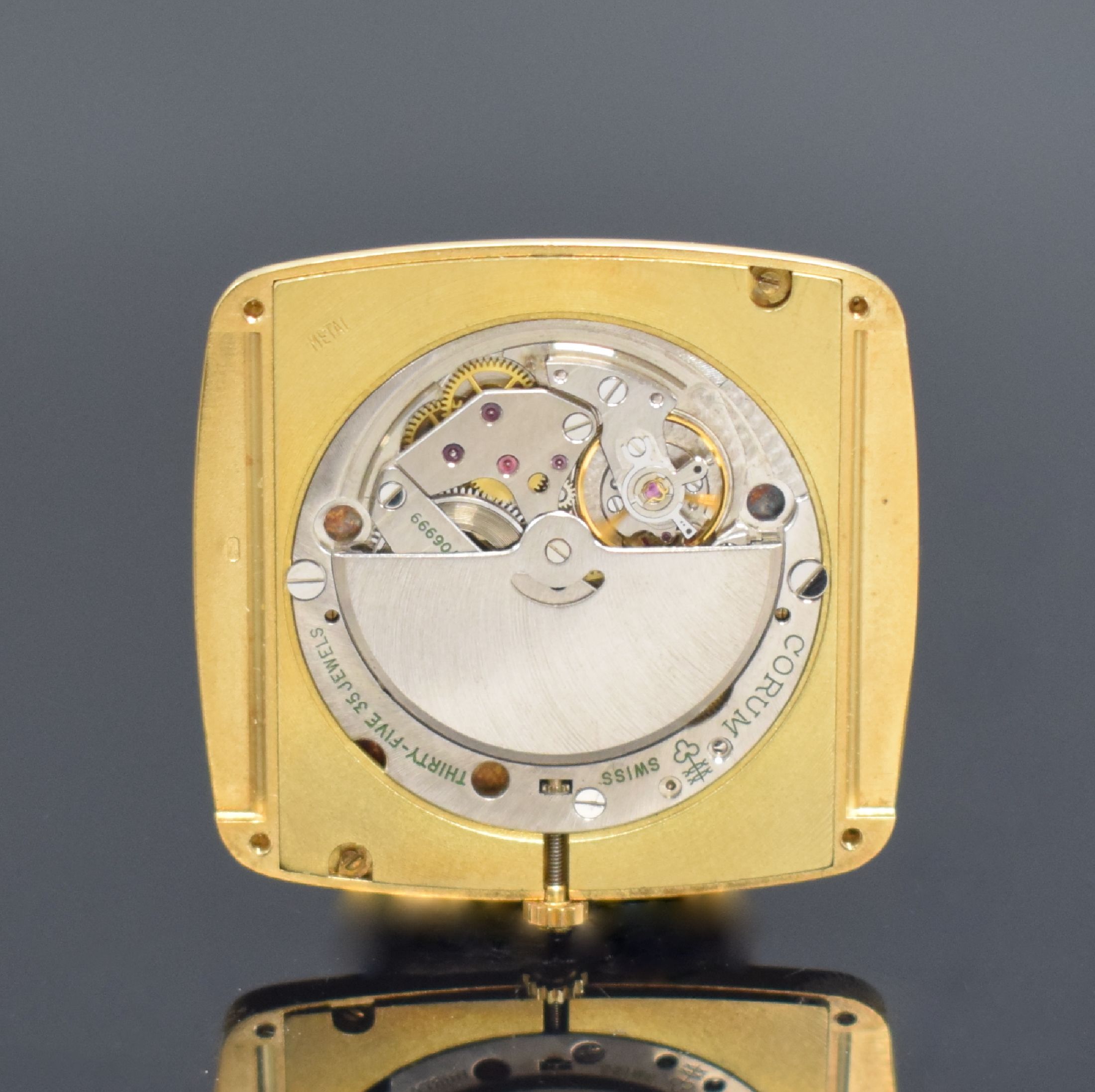 Detail h: CORUM seltene große Herrenarmbanduhr in GG 750/000 Referenz 58301, Schweiz um 1975, Automatik, 2-teil. Geh., Boden 4-fach verschr., gold. Zifferbl., ...