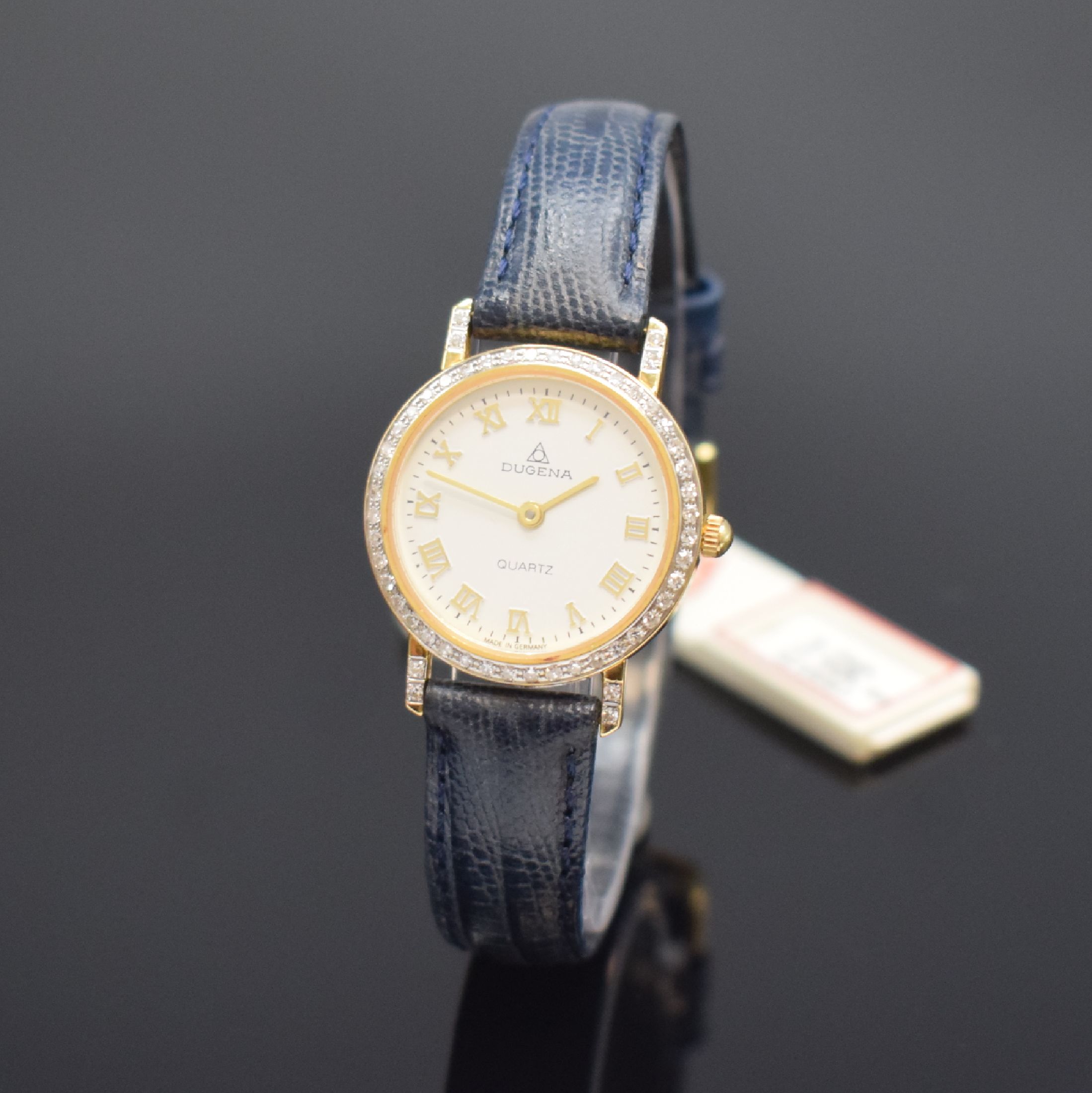 DUGENA Damenarmbanduhr in GG 585/000, Deutschland um 1995, quarz, 2-teil. Gehäuse, Boden aufgedr., Lünette u. Bandanstöße m. Diamanten bes., ...
