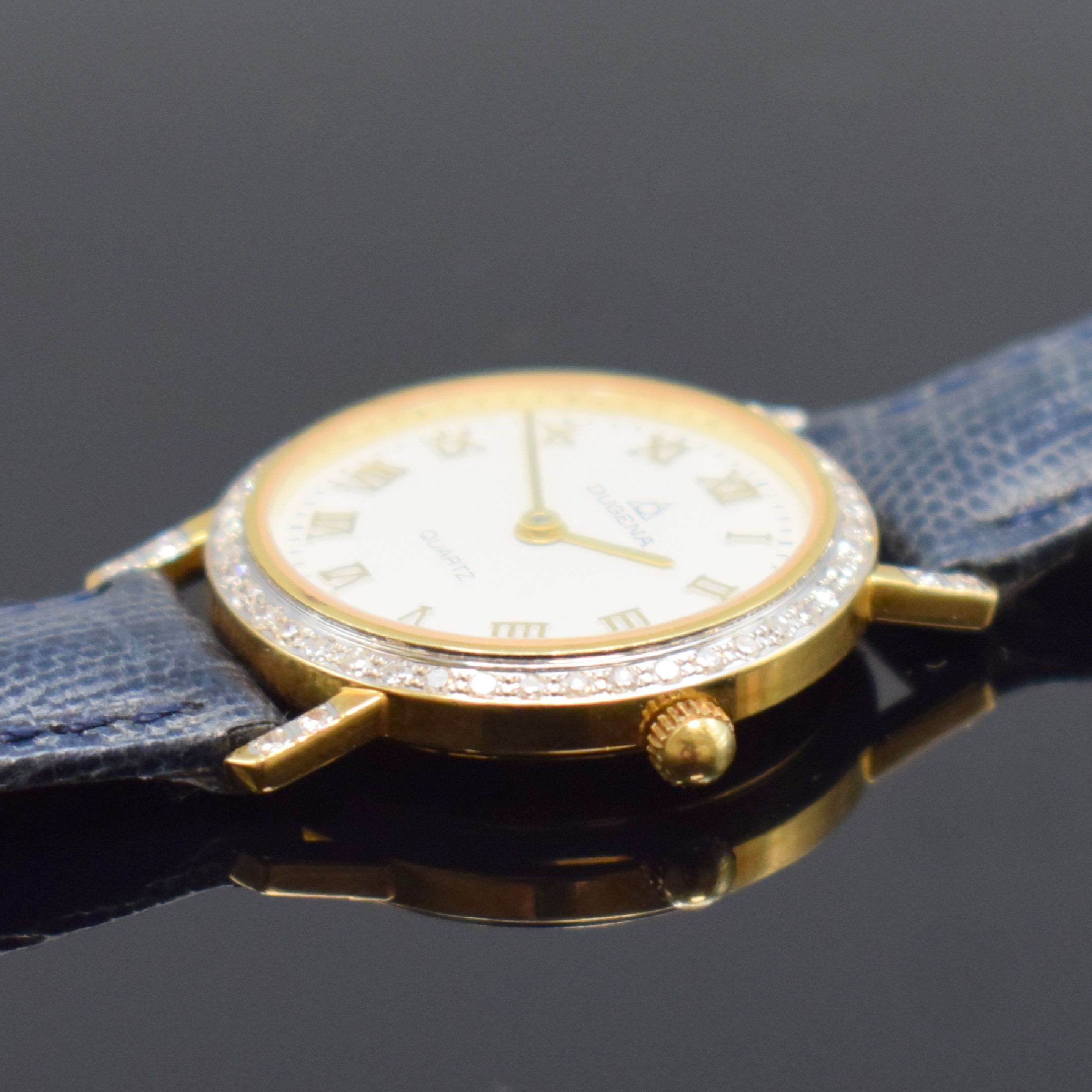 Detail b: DUGENA Damenarmbanduhr in GG 585/000, Deutschland um 1995, quarz, 2-teil. Gehäuse, Boden aufgedr., Lünette u. Bandanstöße m. Diamanten bes., ...
