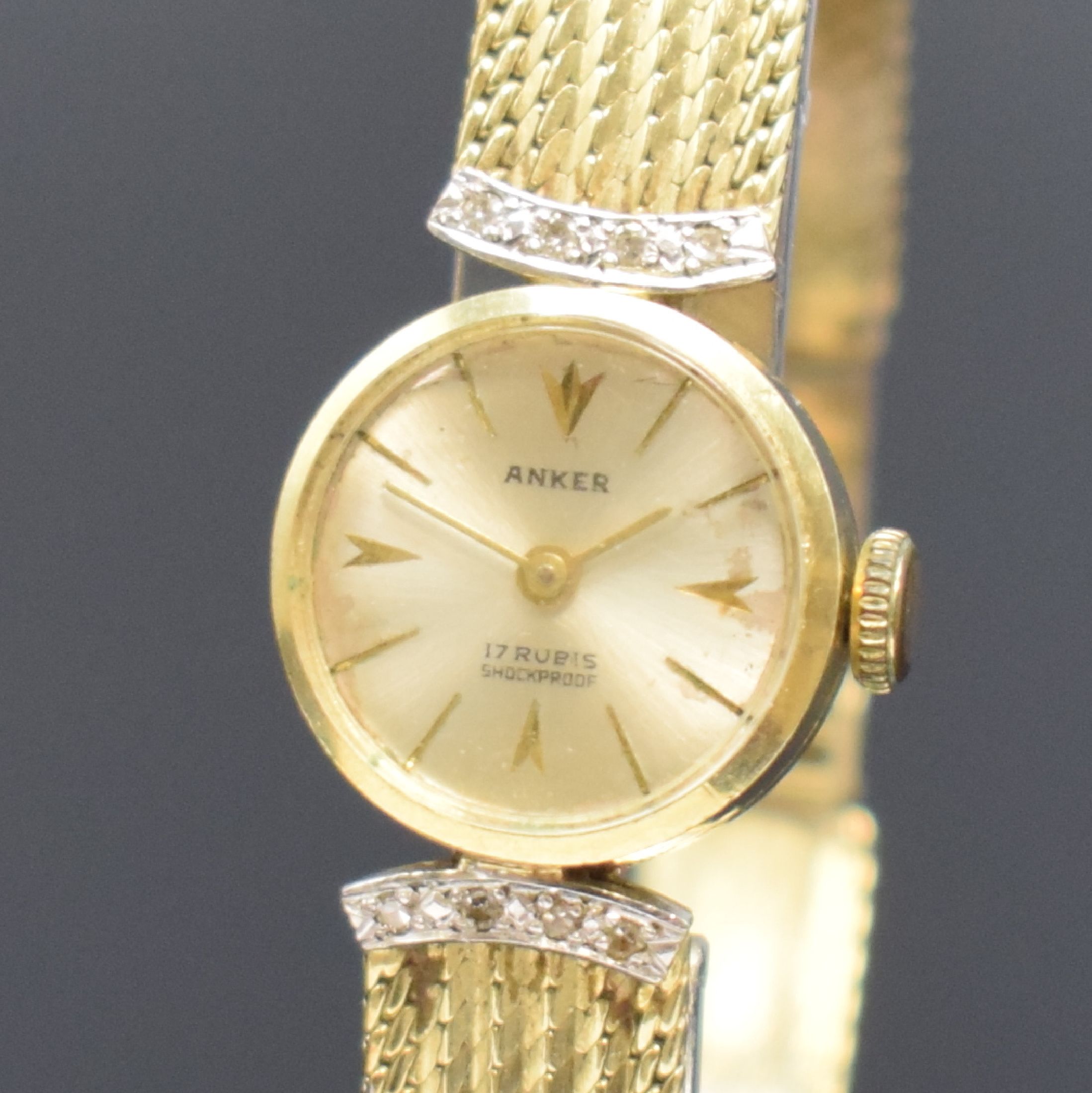 Detail a: ANKER Damenarmbanduhr in GG 585/000, Deutschland um 1960, Handaufzug, 2-teil. Geh., Boden aufgedr., Milanaiseband, silb. Zifferbl., gold. Zeiger, ...