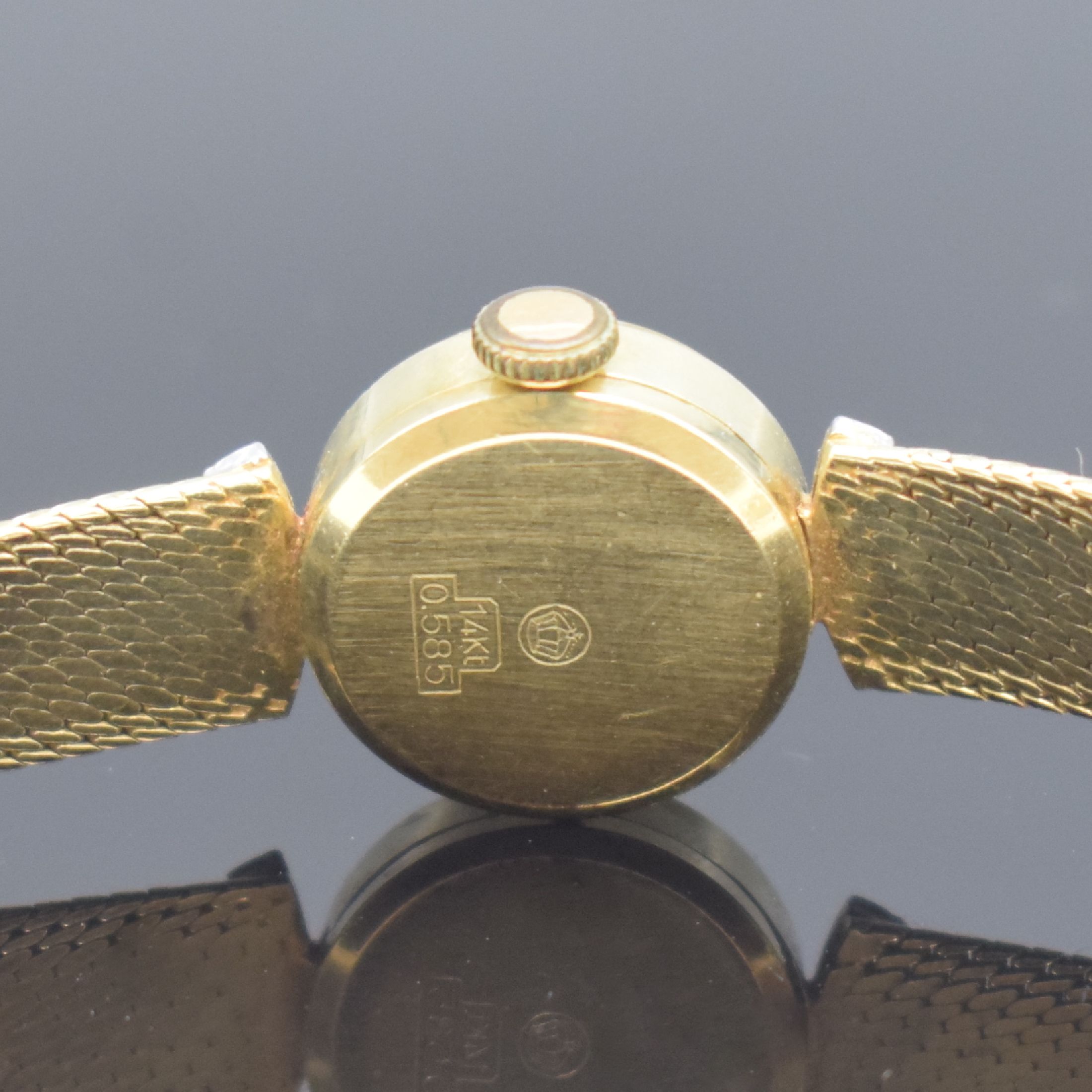 Detail c: ANKER Damenarmbanduhr in GG 585/000, Deutschland um 1960, Handaufzug, 2-teil. Geh., Boden aufgedr., Milanaiseband, silb. Zifferbl., gold. Zeiger, ...