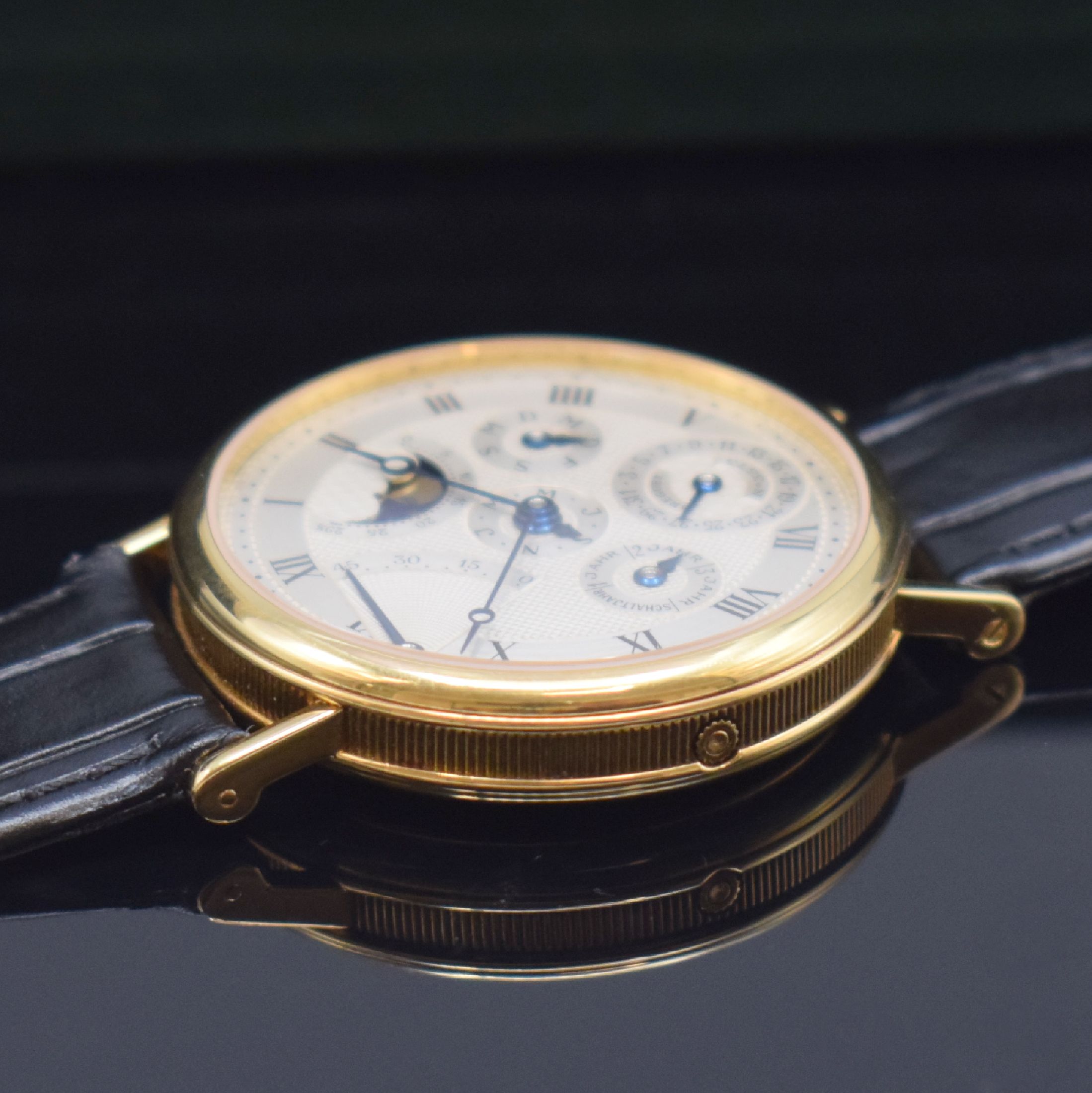Detail d: BREGUET astronomische Herrenarmbanduhr mit ewigem Kalender Referenz BA 3310 in GG 750/000, Schweiz verk. lt. orig. Pap. 1988, Automatik, gedr. Geh., ...