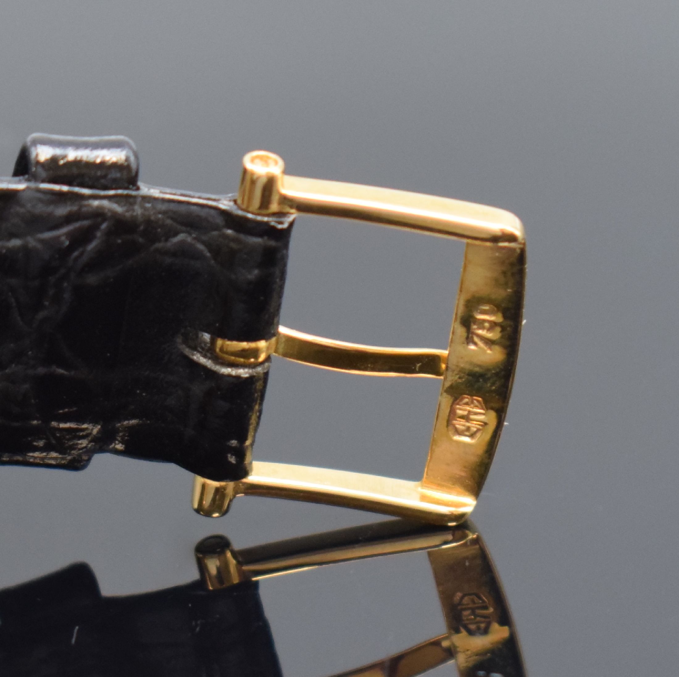 Detail b: BREGUET Herrenarmbanduhr mit Vollkalender und Mondphase in GG 750/000, Schweiz um 1990, Automatik, gedr. Geh. m. geripptem Rand, seitl. Korrekturdr. ...
