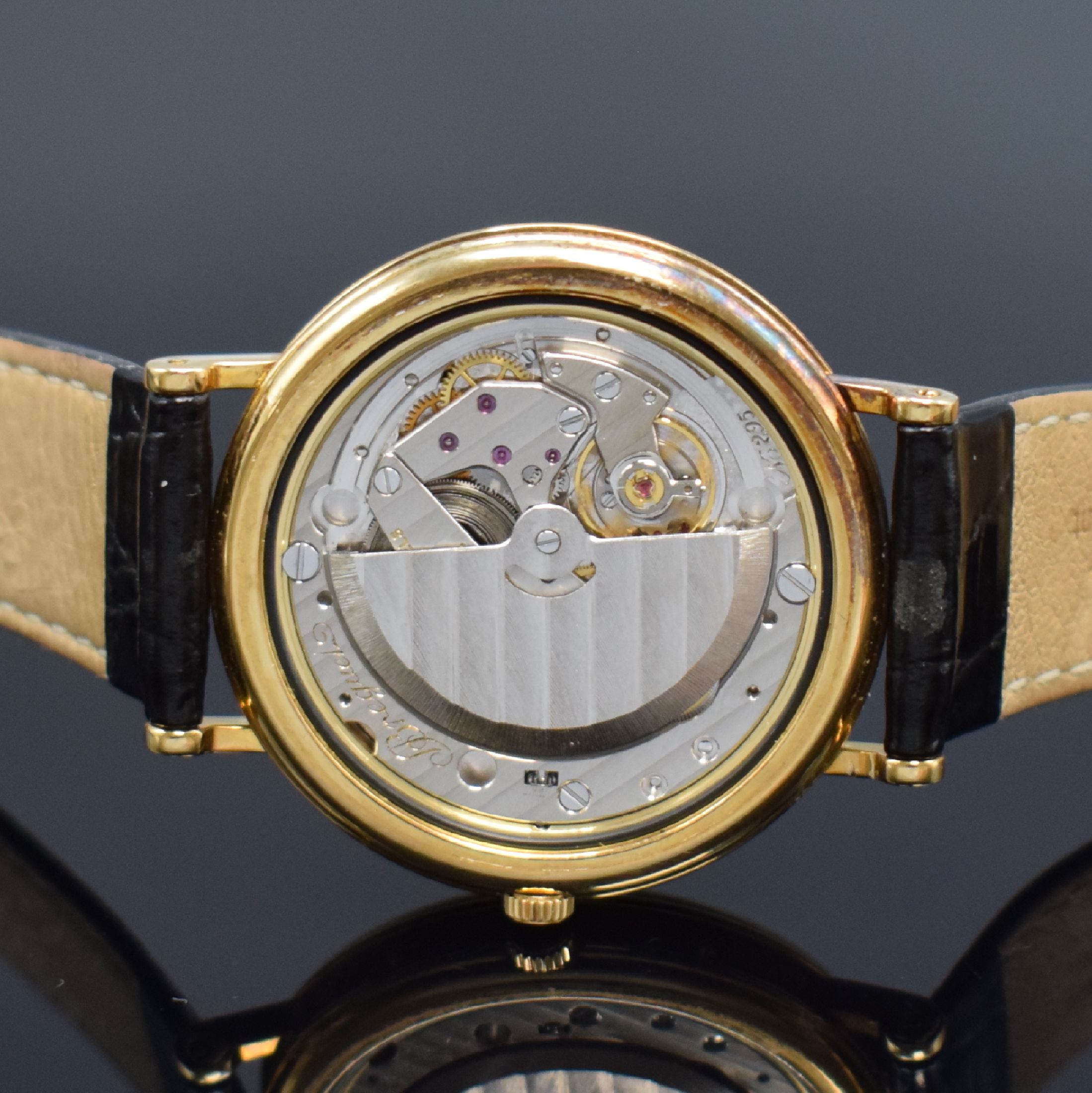 Detail g: BREGUET Herrenarmbanduhr mit Vollkalender und Mondphase in GG 750/000, Schweiz um 1990, Automatik, gedr. Geh. m. geripptem Rand, seitl. Korrekturdr. ...