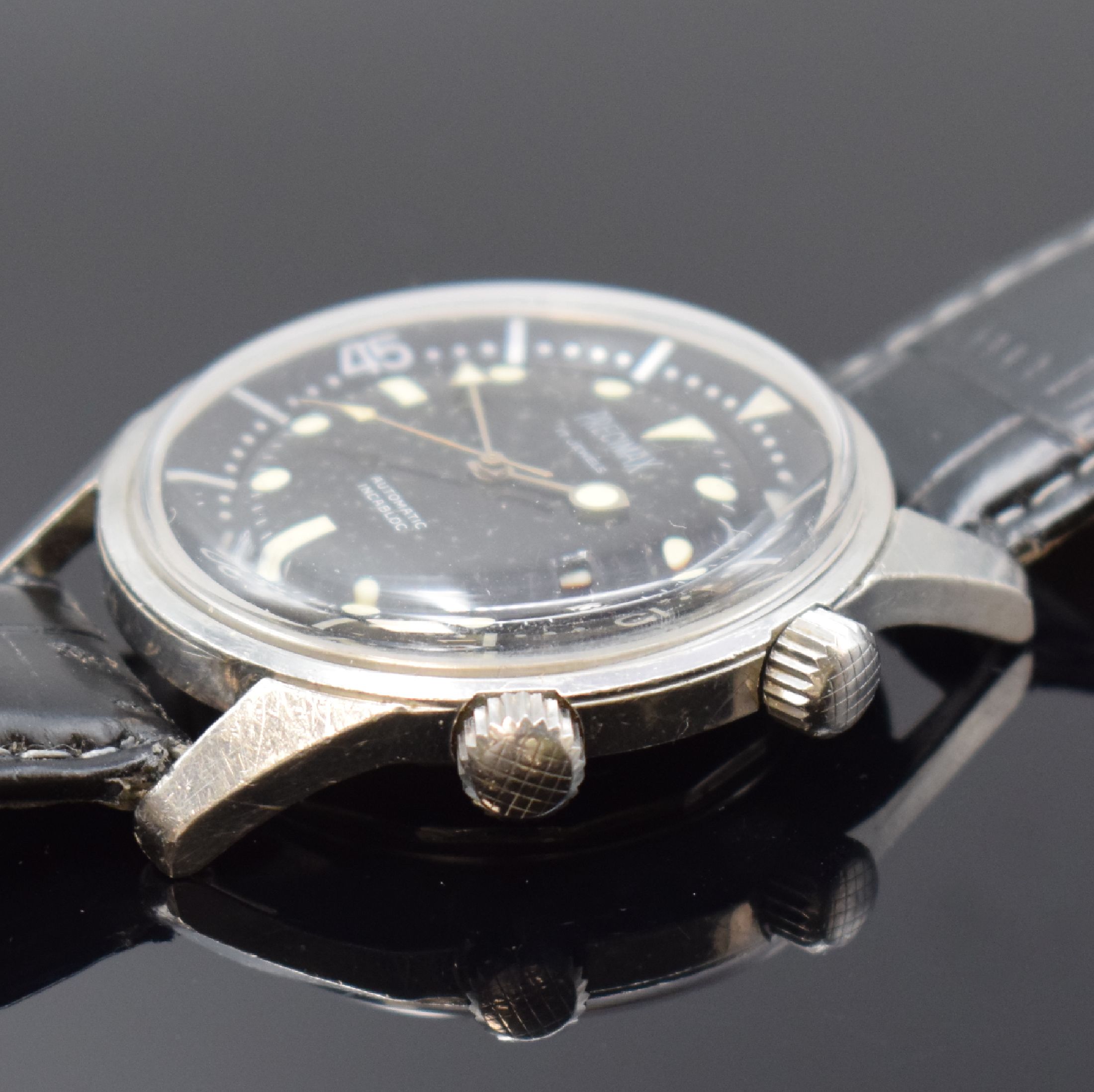 Detail b: PRECIMAX Herrenarmbanduhr in Stahl, Schweiz um 1965, Automatik, geschr. Boden innen sign. Super-Compressor, Patent-Nr. 317537 u. 337462, schwarzes ...