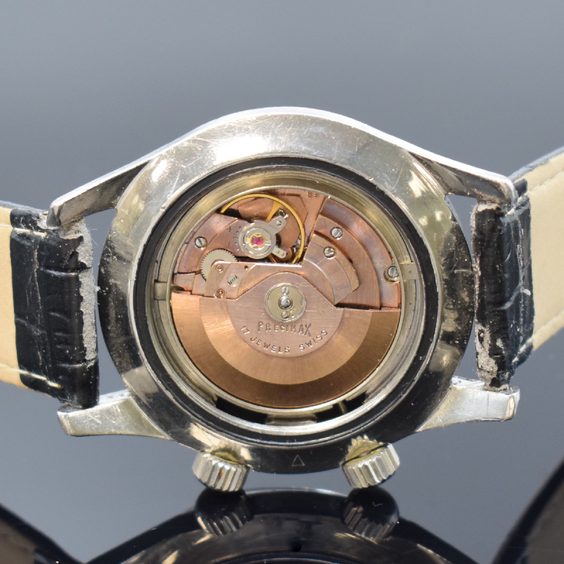 Detail e: PRECIMAX Herrenarmbanduhr in Stahl, Schweiz um 1965, Automatik, geschr. Boden innen sign. Super-Compressor, Patent-Nr. 317537 u. 337462, schwarzes ...
