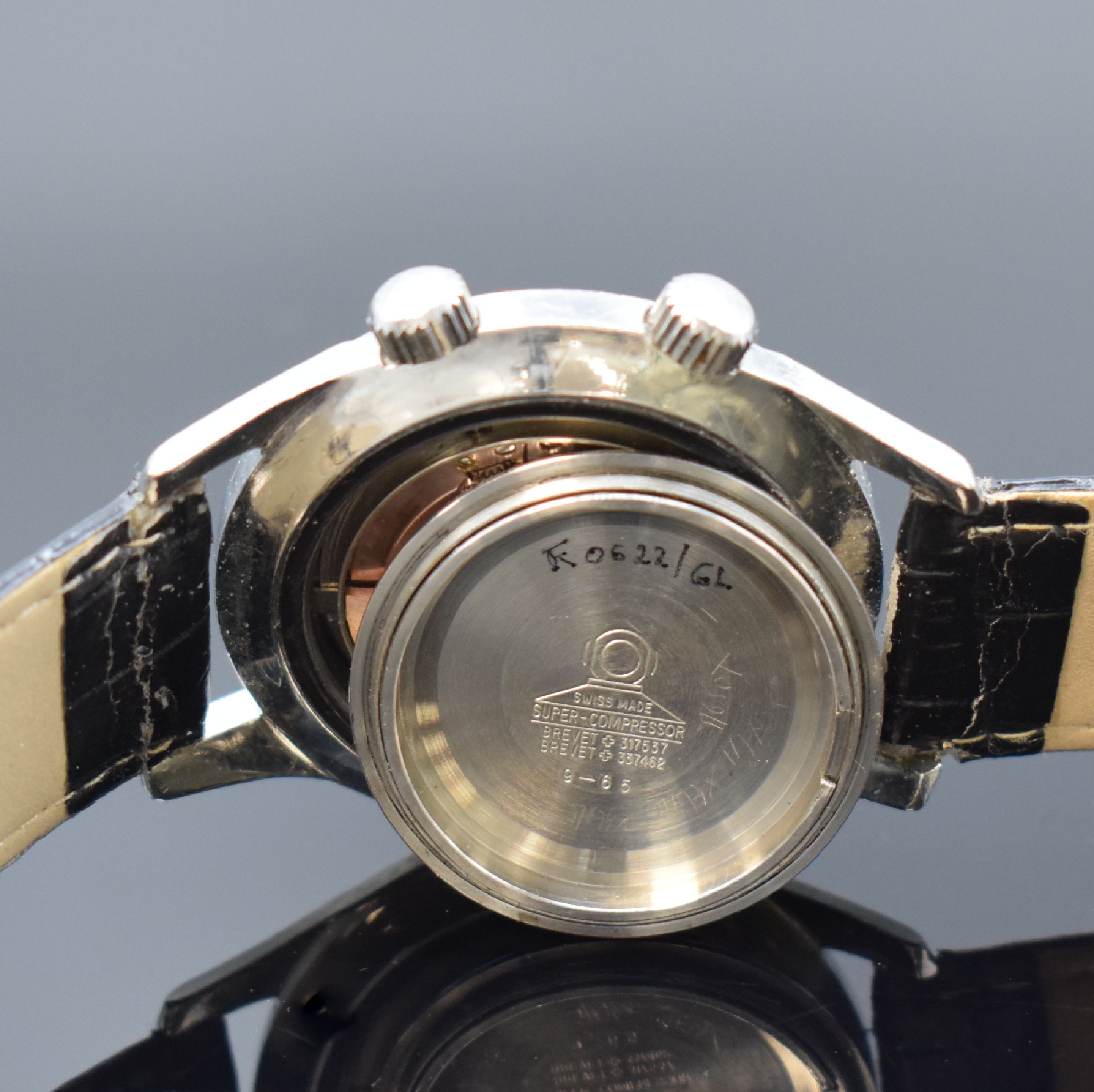 Detail f: PRECIMAX Herrenarmbanduhr in Stahl, Schweiz um 1965, Automatik, geschr. Boden innen sign. Super-Compressor, Patent-Nr. 317537 u. 337462, schwarzes ...