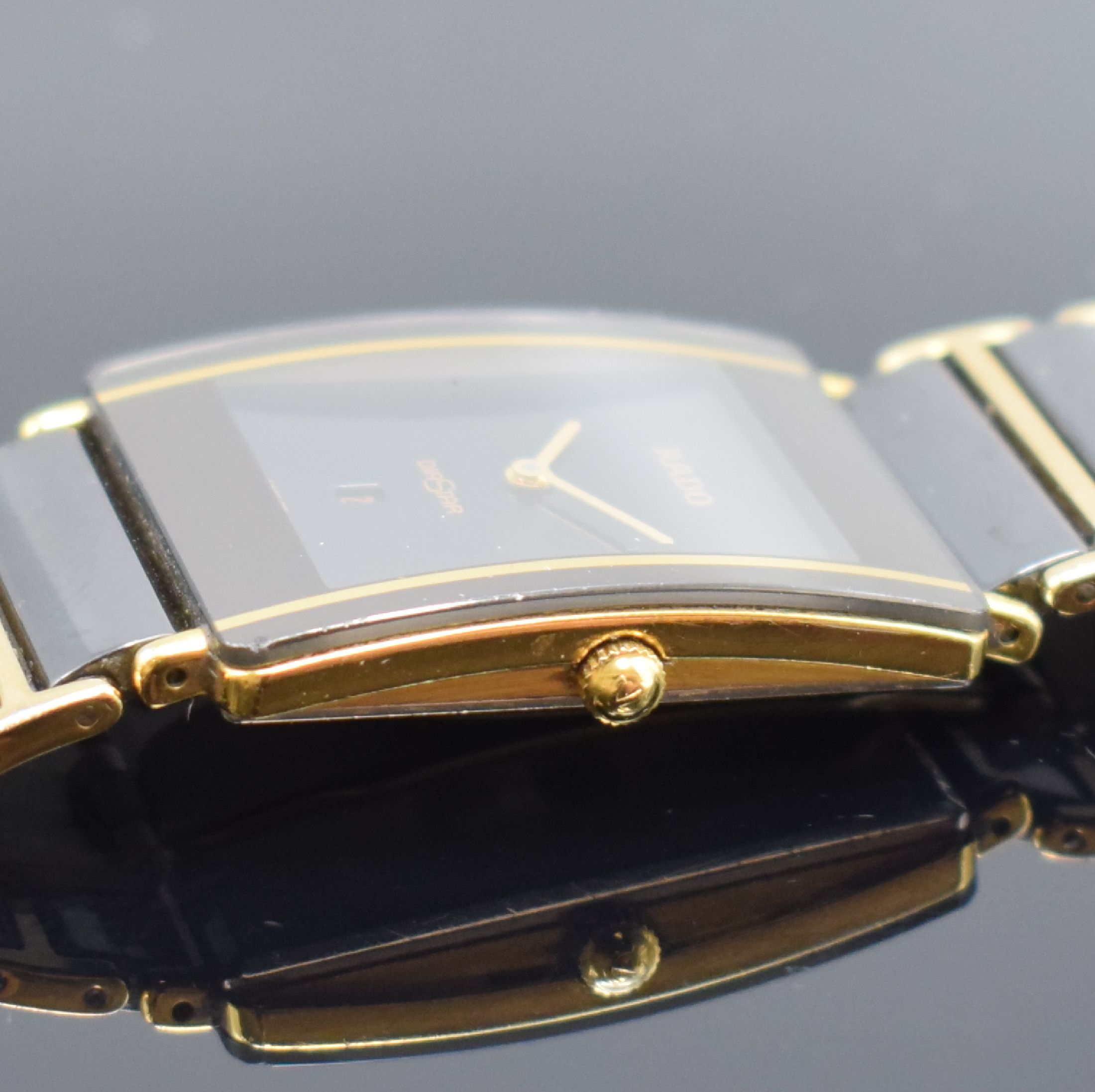 Detail c: RADO Diastar Herrenarmbanduhr Referenz 160.0282.3, Schweiz um 1995, quarz, Geh. in Stahl teils verg., Keramik-Gliederband m. dopp. Faltschl. (zu ...