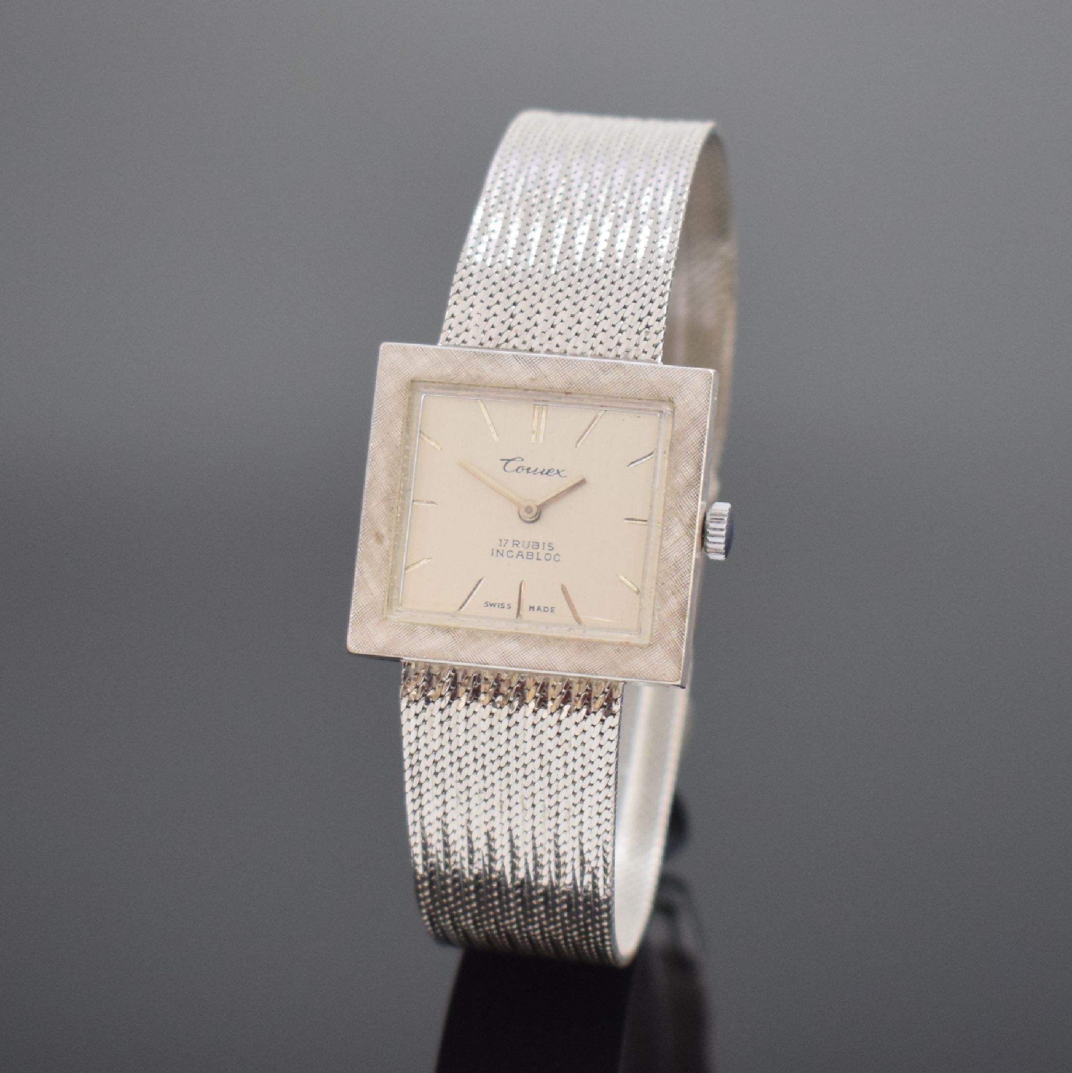 COMEX Armbanduhr in WG 585/000, Schweiz um 1960, Handaufzug, 2-teil. Geh., Boden aufgedr., silb. Zifferbl. m. aufges. Std.- Ind., silb. Zeiger, ...