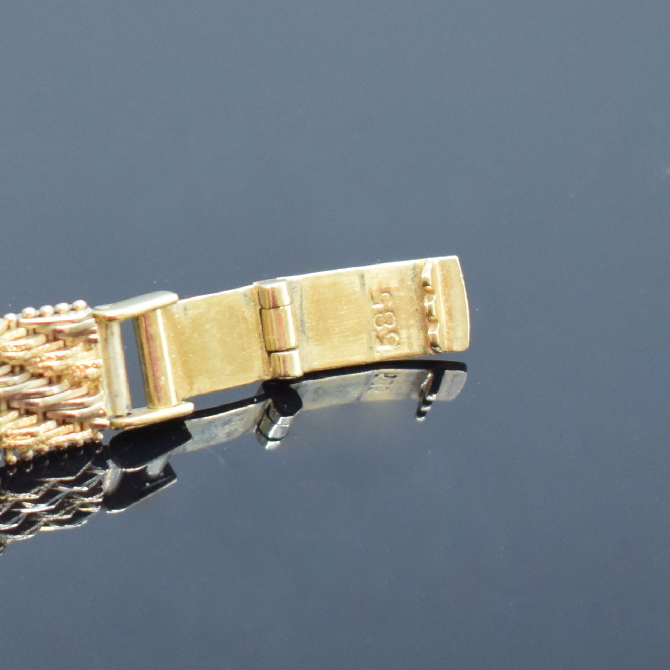 Detail b: ANKER Damenarmbanduhr in GG 585/000, Schweiz um 1975, Handaufzug, Boden aufgedr., silb. strukt. Zifferbl. altersbed. fl., aufges. gold. Std.-Ind., ...
