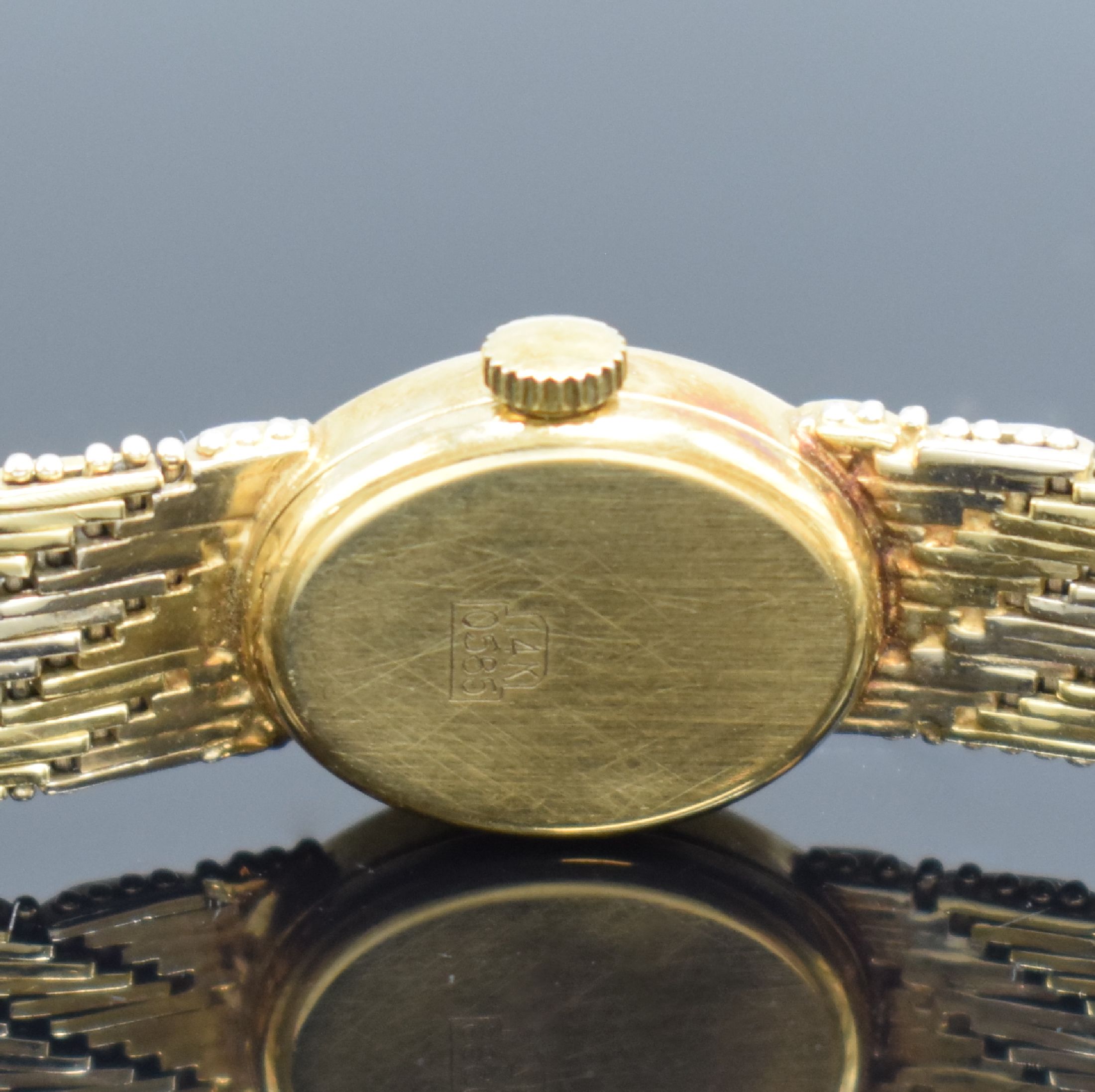 Detail c: ANKER Damenarmbanduhr in GG 585/000, Schweiz um 1975, Handaufzug, Boden aufgedr., silb. strukt. Zifferbl. altersbed. fl., aufges. gold. Std.-Ind., ...