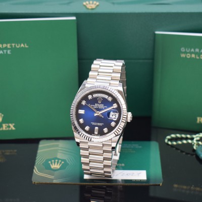 Image ROLEX wristwatch Oyster Perpetual Day-Date 36 reference 128239, self winding, sold in February 2021, superlative chronometer officially certified, 18k white gold including president bracelet with deployant clasp, screwed-down case back & winding crown, "Blue Ombre" dial with 10 in white gold set diamond indices, display of hours, minutes, sweep seconds, day & date, diameter approx. 36 mm, length approx. 19,5 cm, original box & papers, condition 1-2
