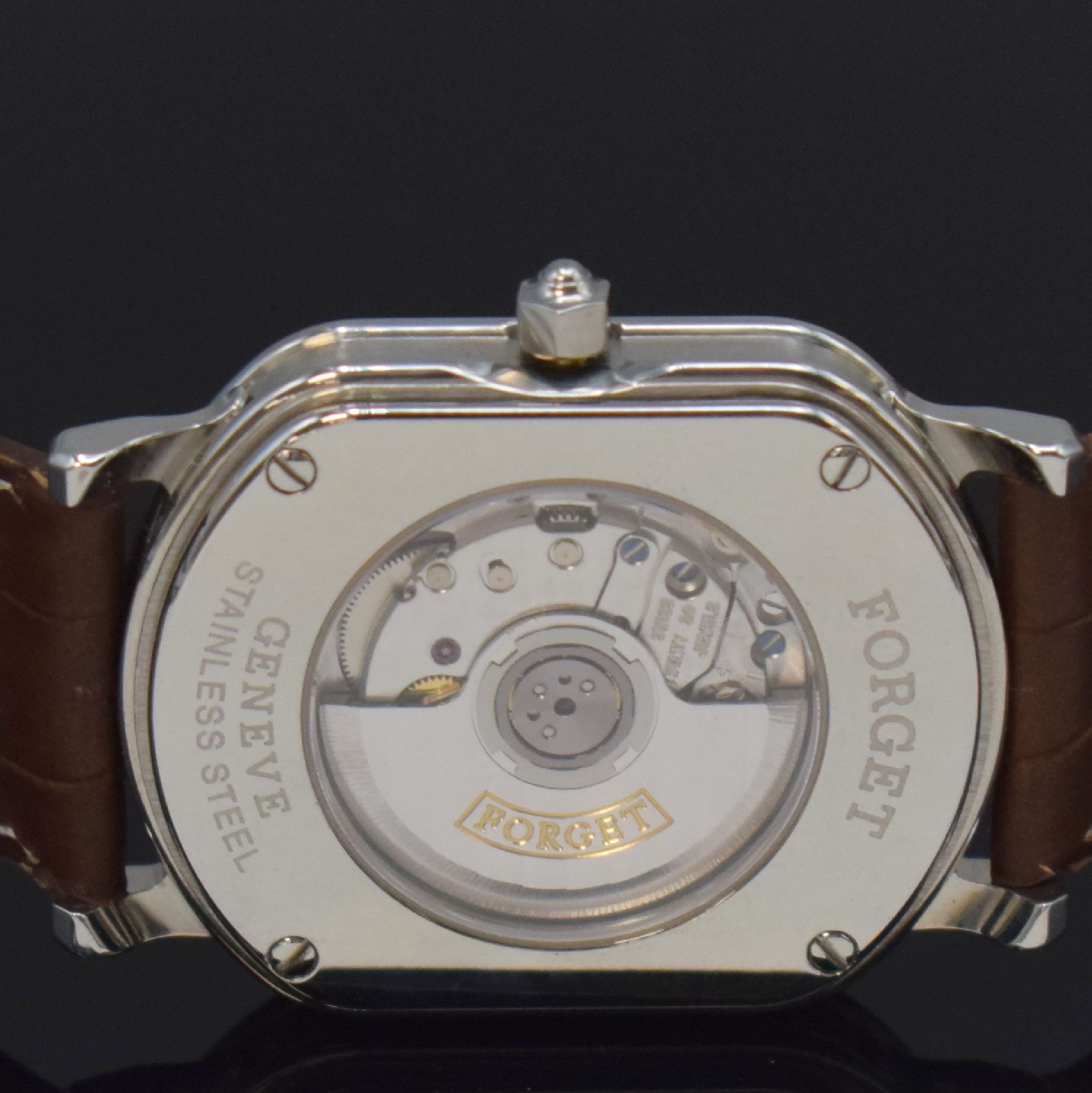 Detail d: FORGET ungetragene Armbanduhr in Edelstahl, Schweiz um 1990, Automatik, aufwendiges, rechteck. und beids. vergl. Geh., Boden 4-fach verschr., ...
