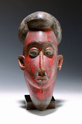 Image 26621133 - Face mask, Baule, Ivory Coast, 2nd half of the20th century, carved wood, painted red and black, rubbed and age related damage, h. 31 cm