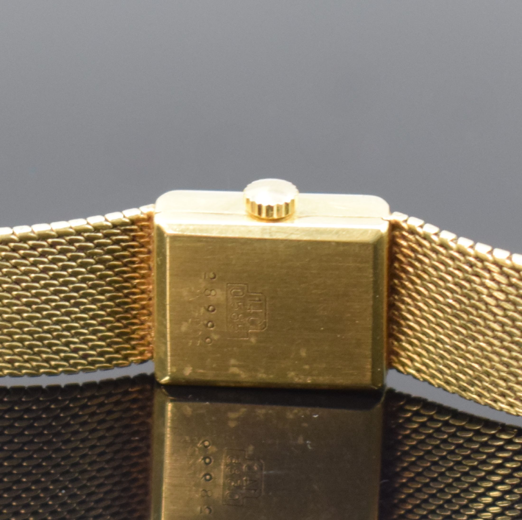 Detail c: BEUCE / NIVADA Armbanduhr in GG 585/000, Schweiz um 1975, Handaufzug, Boden aufgedr., silb. Zifferbl. m. gold. Std.-Ind. altersbed. pat., gold. ...