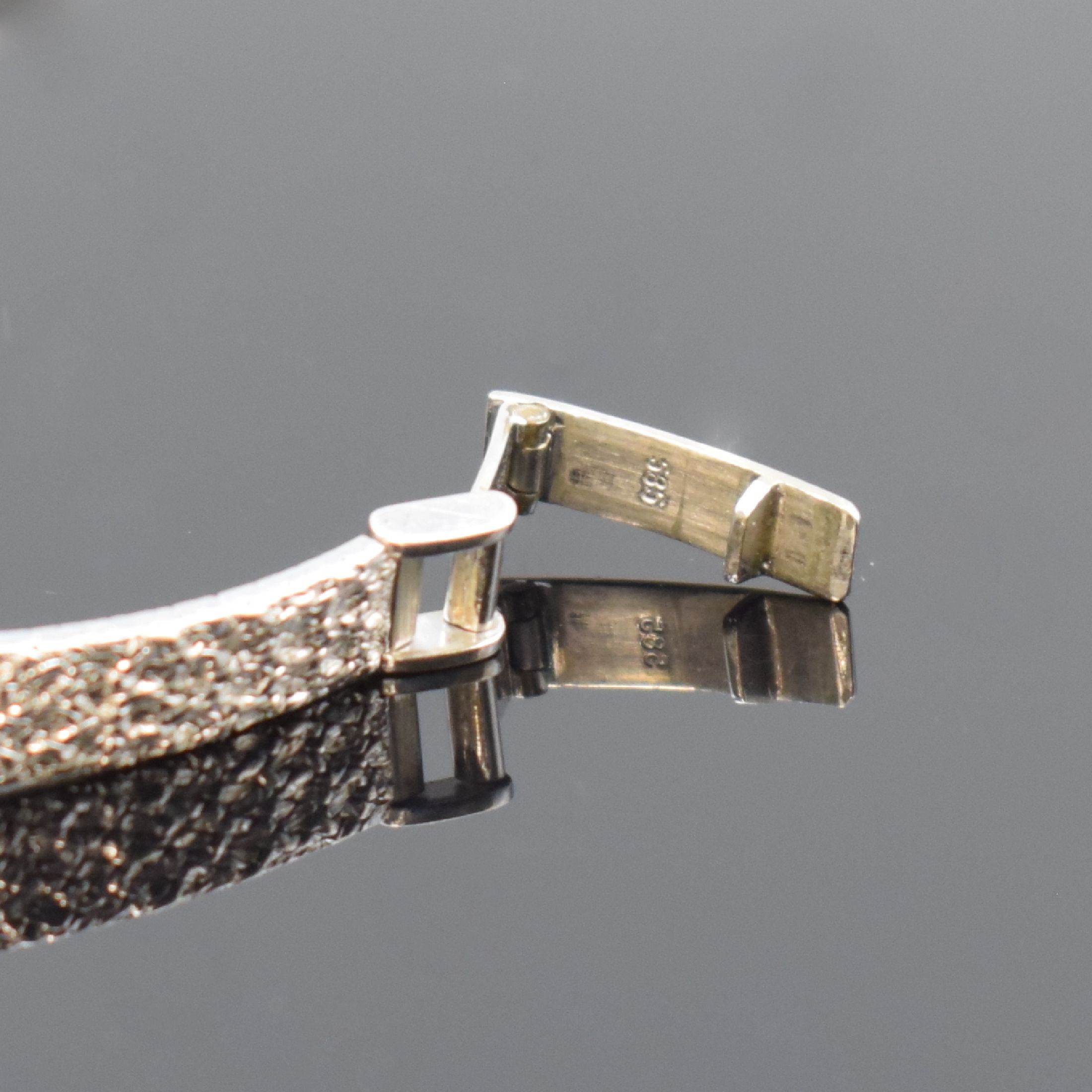 Detail b: EM Damengoldbanduhr in WG 585/000, Schweiz um 1975, Handaufzug, Boden aufgedr., graues Zifferbl. m. silb. Std.-Ind. u. Zeigern, rotverg. Werk Kal. AS ...