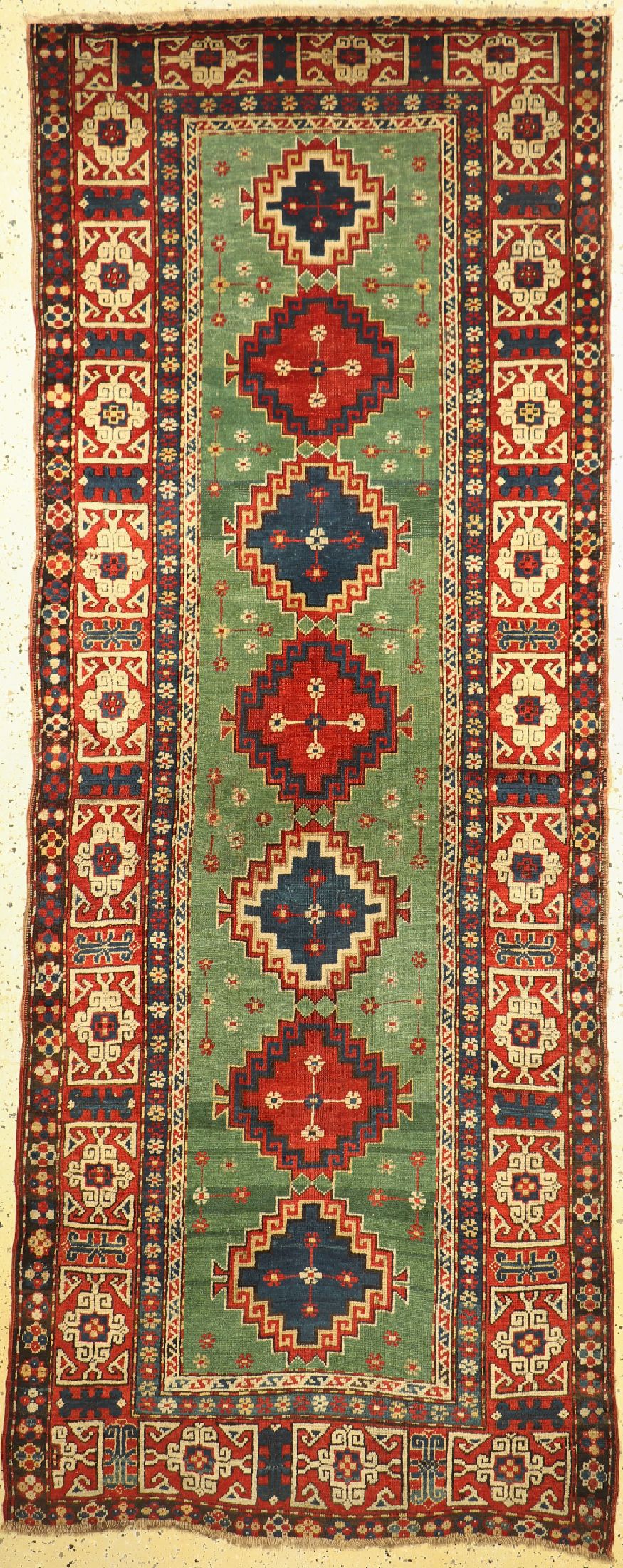 Antiker Kazak, Kaukasus, 19.Jhd, Wolle auf Wolle, ca. 290 x 120 cm, verkürzt, EHZ: 2-3