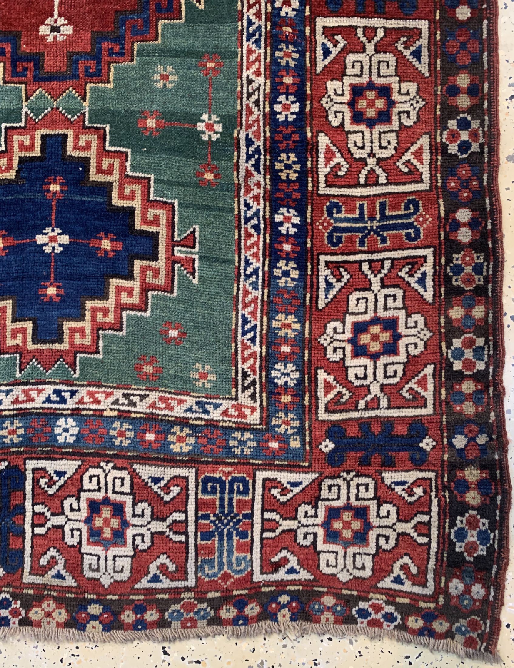 Detail a: Antiker Kazak, Kaukasus, 19.Jhd, Wolle auf Wolle, ca. 290 x 120 cm, verkürzt, EHZ: 2-3