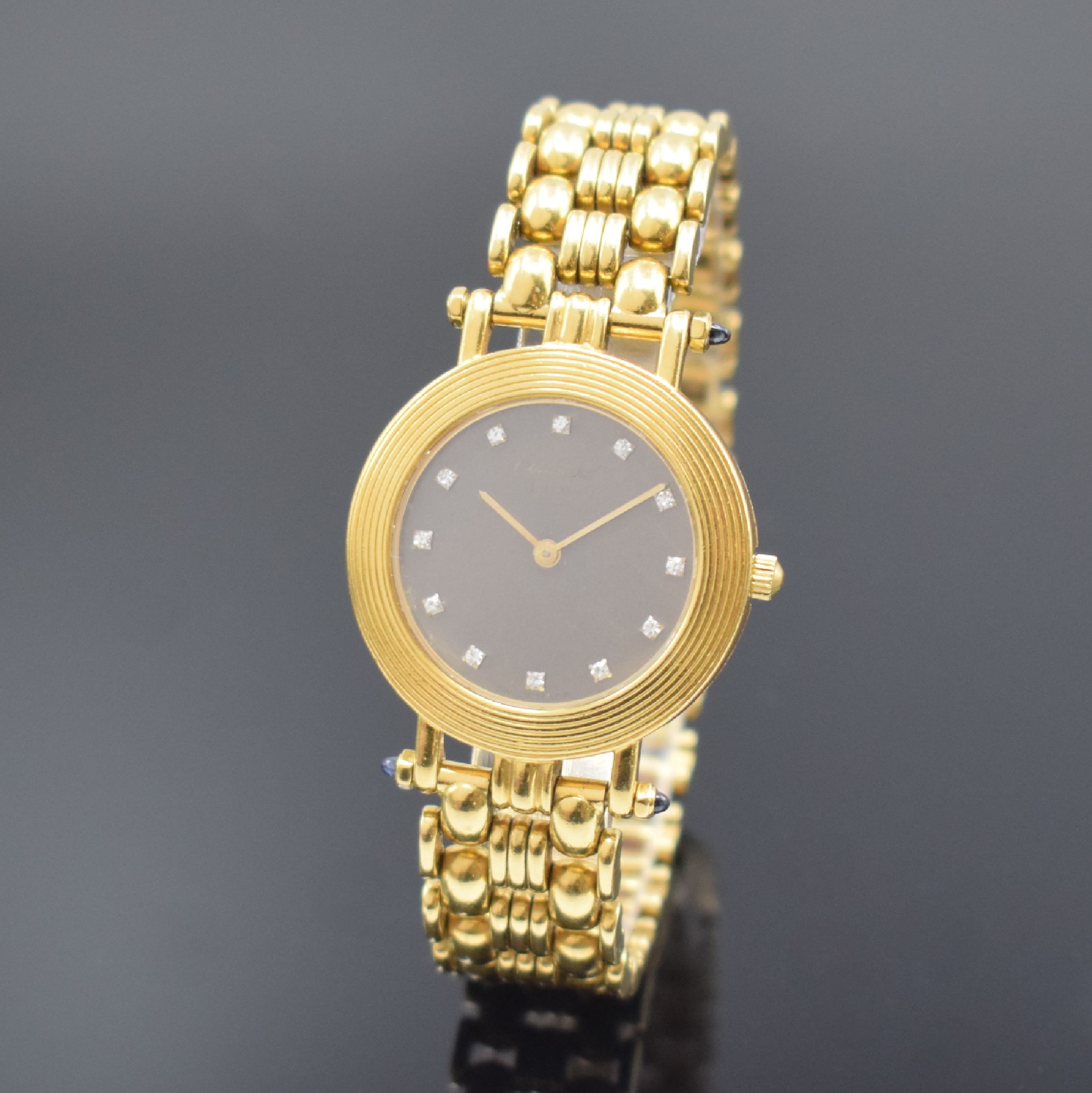 CHOPARD Damenarmbanduhr in GG 750/000, Schweiz um 1975, quarz, Stülpgeh., Chopard Goldband in GG 750/000, Schmuck-Cabochons (1x fehl.), graues ...