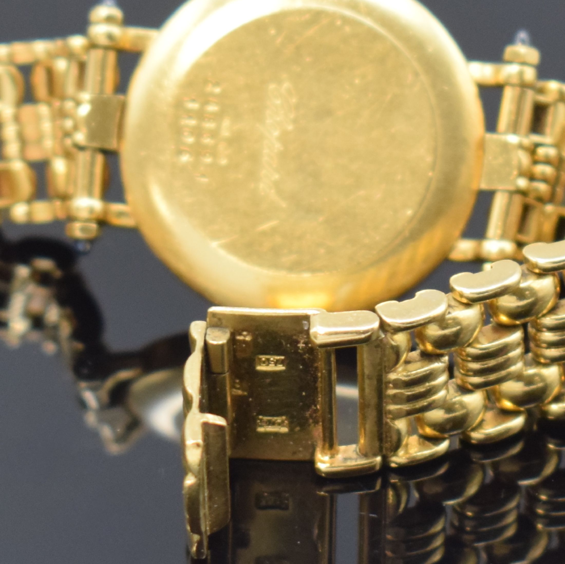 Detail c: CHOPARD Damenarmbanduhr in GG 750/000, Schweiz um 1975, quarz, Stülpgeh., Chopard Goldband in GG 750/000, Schmuck-Cabochons (1x fehl.), graues ...
