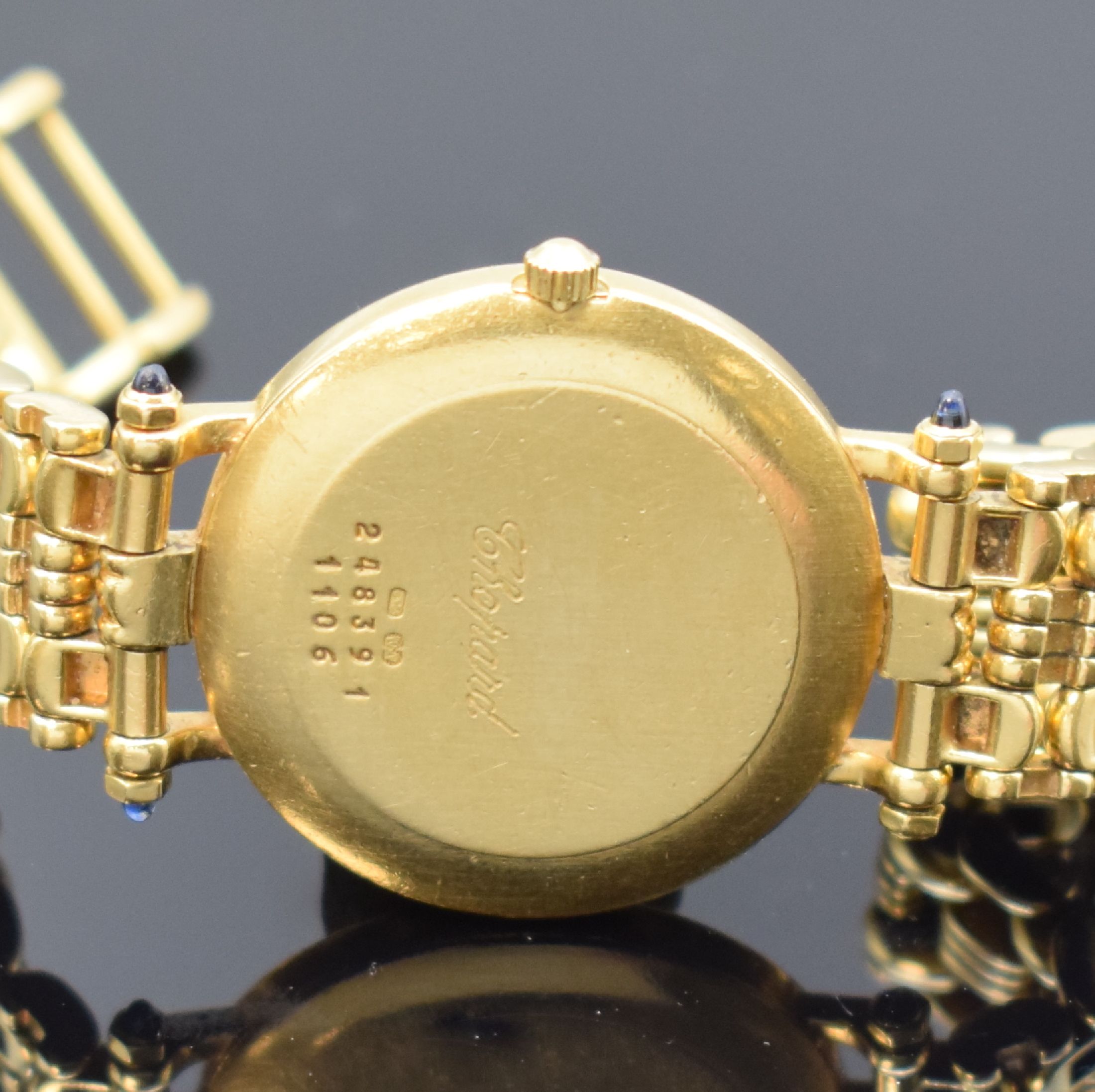 Detail d: CHOPARD Damenarmbanduhr in GG 750/000, Schweiz um 1975, quarz, Stülpgeh., Chopard Goldband in GG 750/000, Schmuck-Cabochons (1x fehl.), graues ...