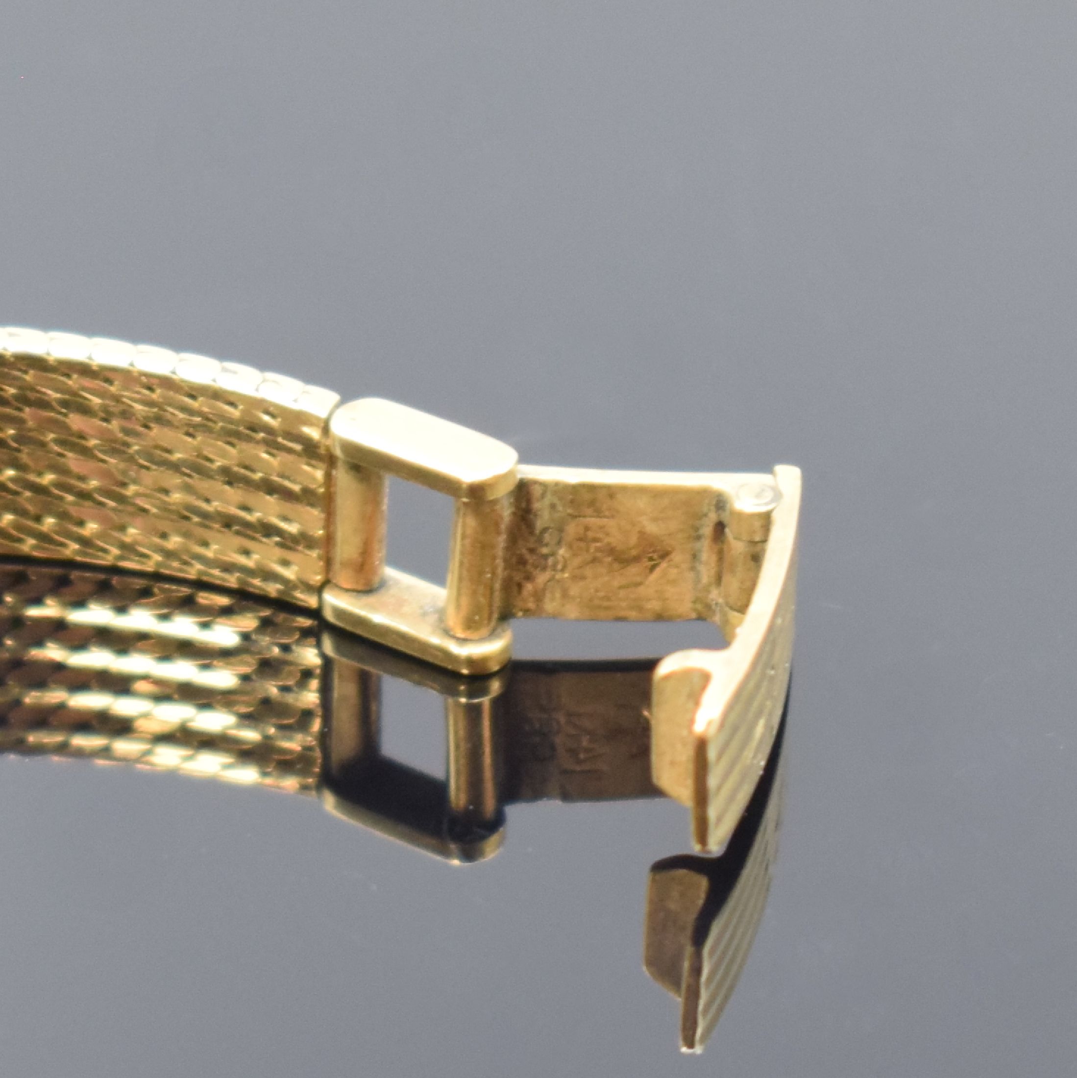 Detail b: WAGNER Damenarmbanduhr in GG 585/000, Schweiz um 1970, Handaufzug, Boden aufgedr., facett. Glas, silb. Zifferbl. m. gold. Ind. u. Zeigern, Ankerwerk, ...