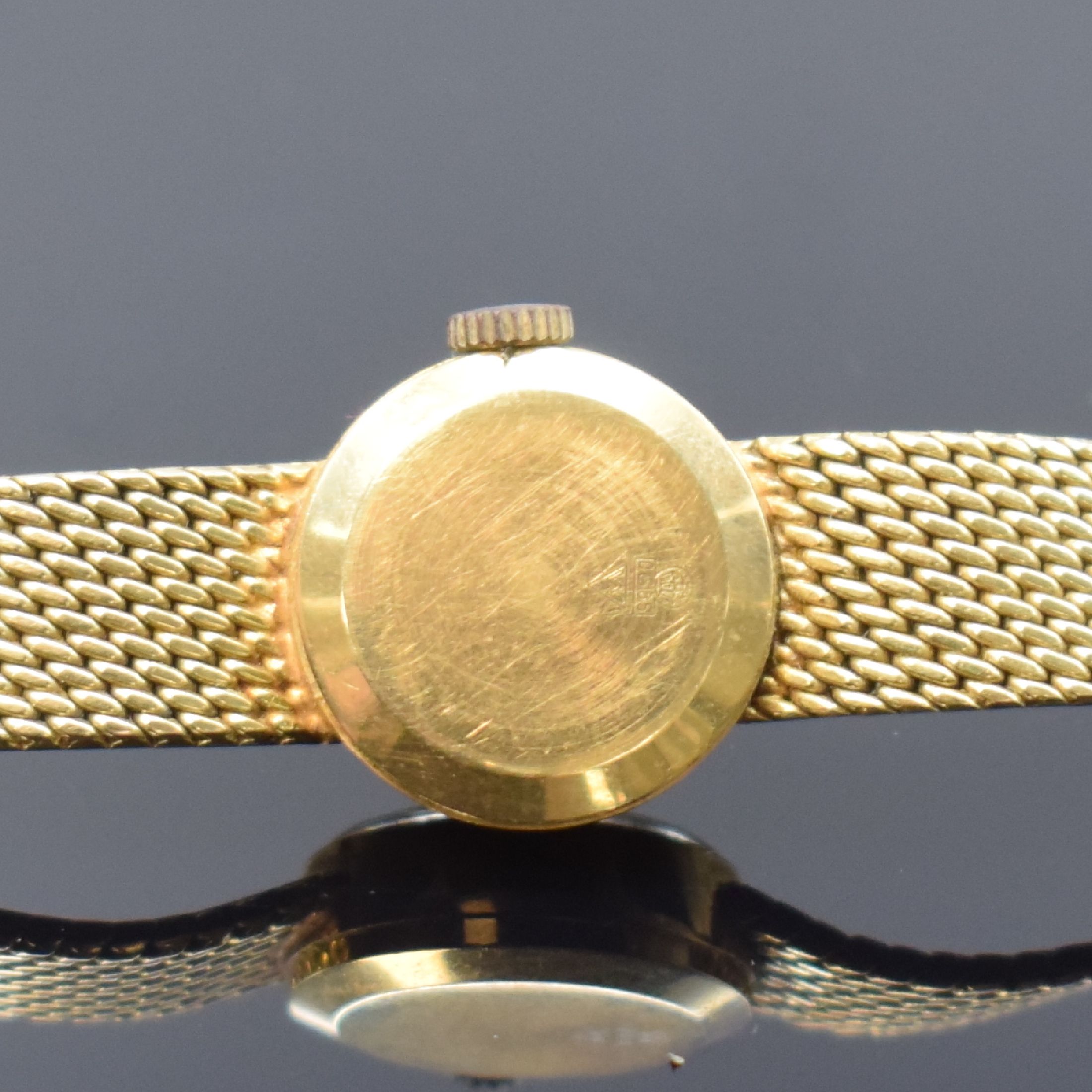 Detail c: WAGNER Damenarmbanduhr in GG 585/000, Schweiz um 1970, Handaufzug, Boden aufgedr., facett. Glas, silb. Zifferbl. m. gold. Ind. u. Zeigern, Ankerwerk, ...