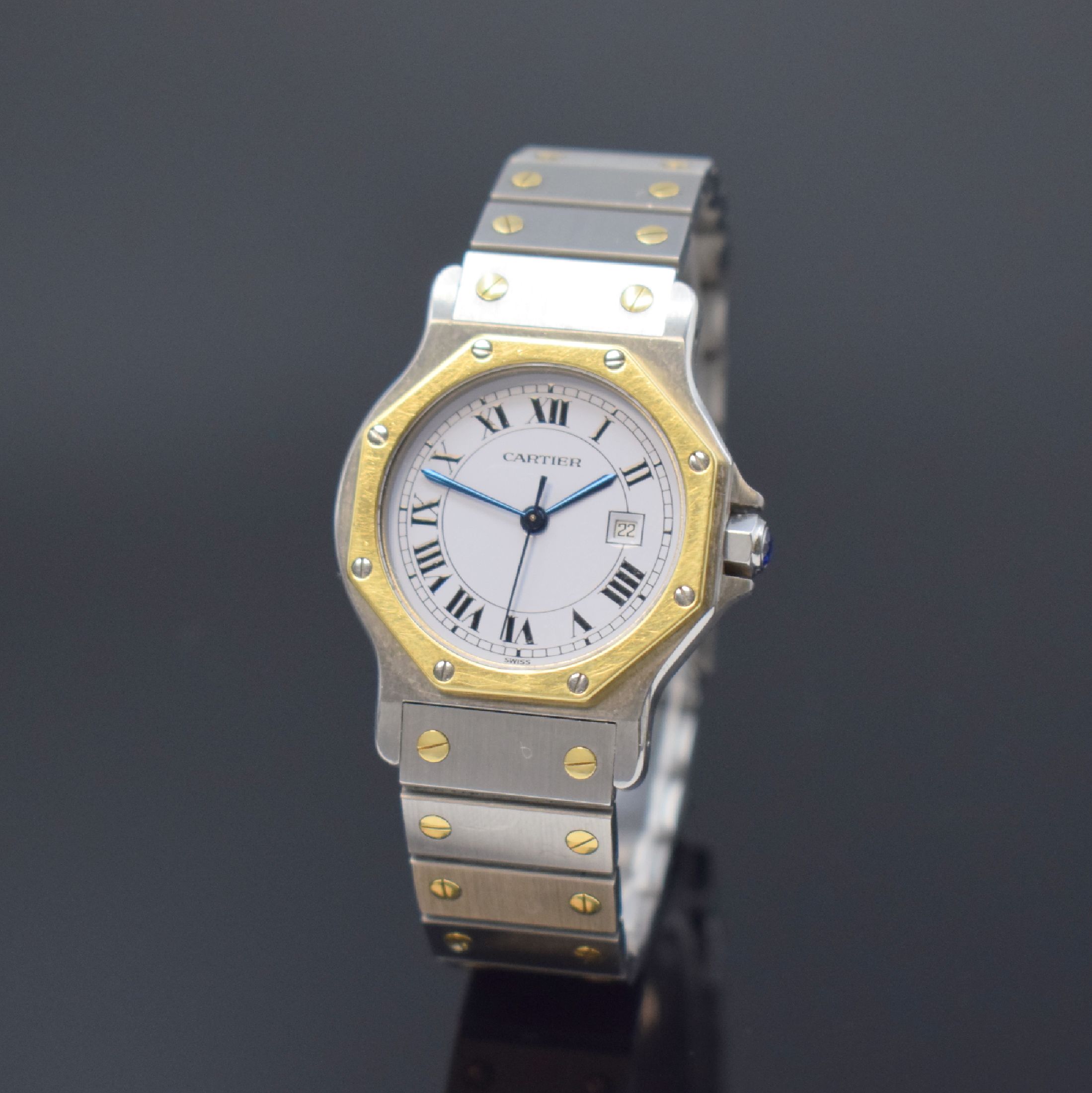 CARTIER Santos Armbanduhr in Stahl/Gold, Schweiz um 1995, Automatik, 8-fach verschr. Monocoque-Geh., 8-eckige Lünette (Goldhaube), orig. Gliederband ...