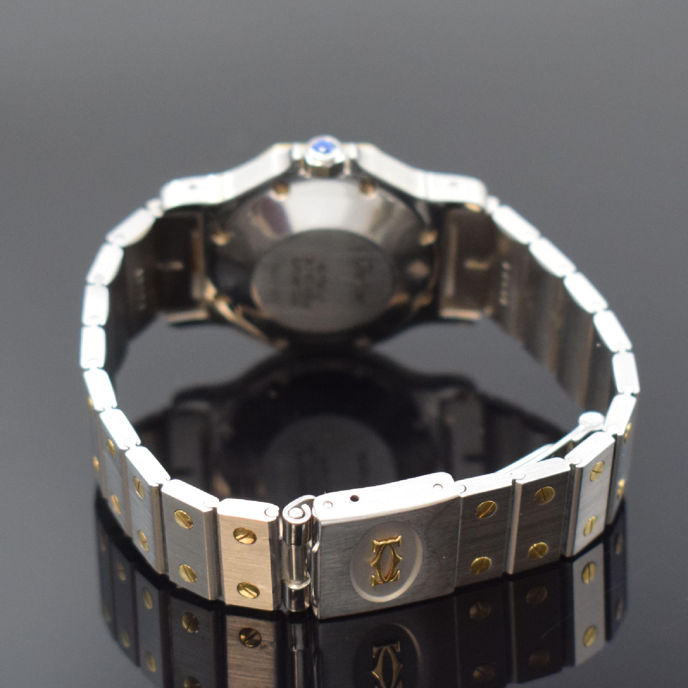 Detail b: CARTIER Santos Armbanduhr in Stahl/Gold, Schweiz um 1995, Automatik, 8-fach verschr. Monocoque-Geh., 8-eckige Lünette (Goldhaube), orig. Gliederband ...