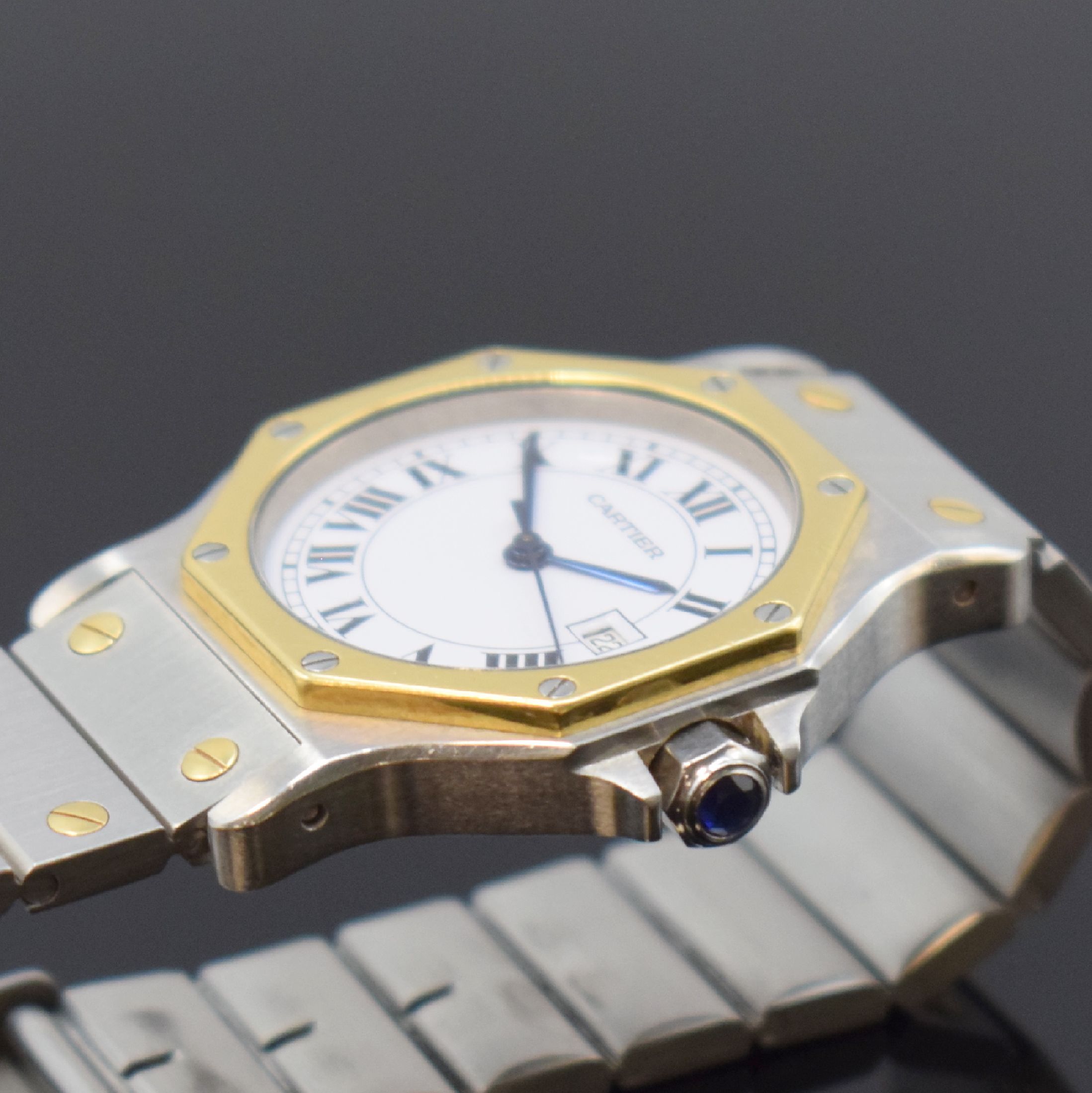 Detail c: CARTIER Santos Armbanduhr in Stahl/Gold, Schweiz um 1995, Automatik, 8-fach verschr. Monocoque-Geh., 8-eckige Lünette (Goldhaube), orig. Gliederband ...
