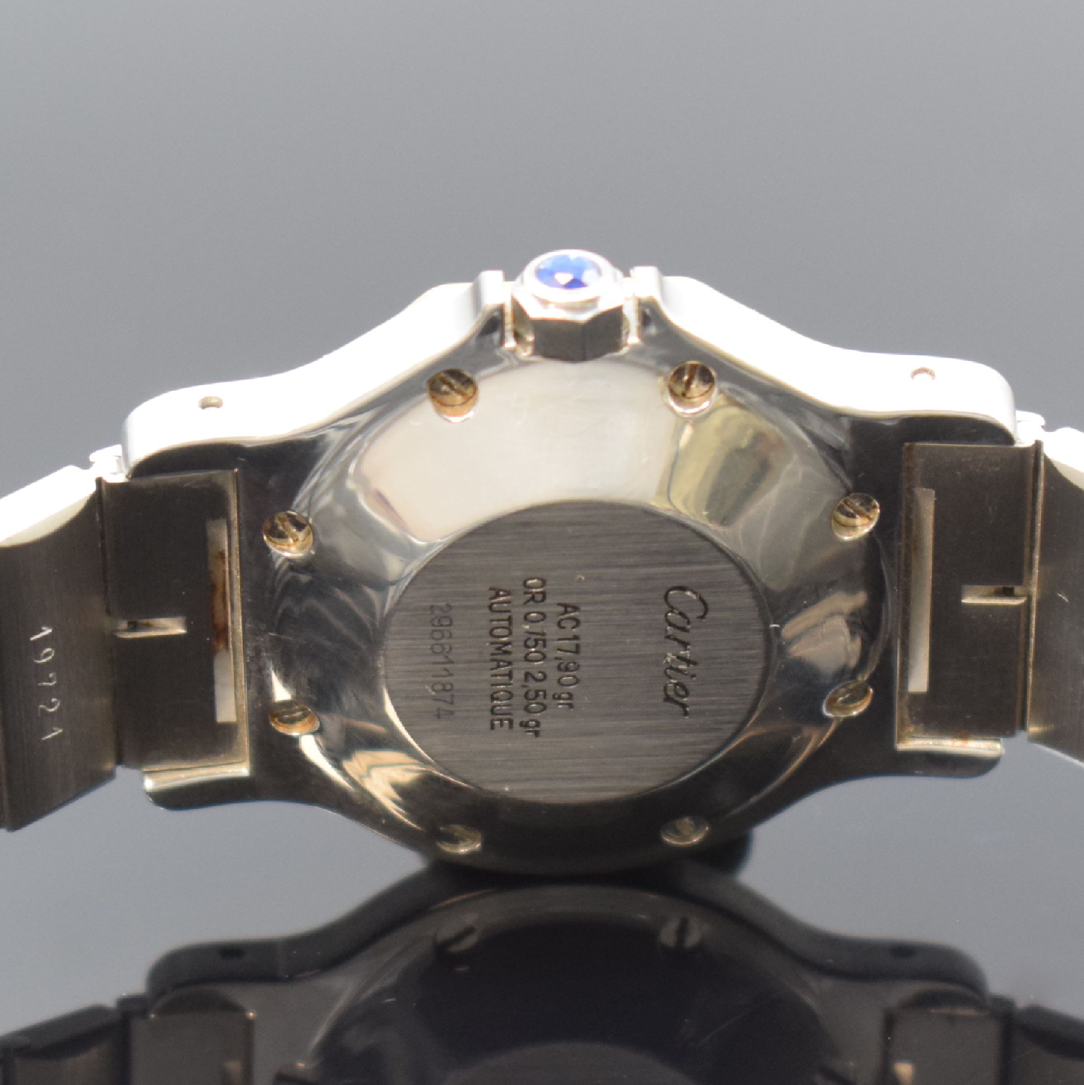 Detail d: CARTIER Santos Armbanduhr in Stahl/Gold, Schweiz um 1995, Automatik, 8-fach verschr. Monocoque-Geh., 8-eckige Lünette (Goldhaube), orig. Gliederband ...