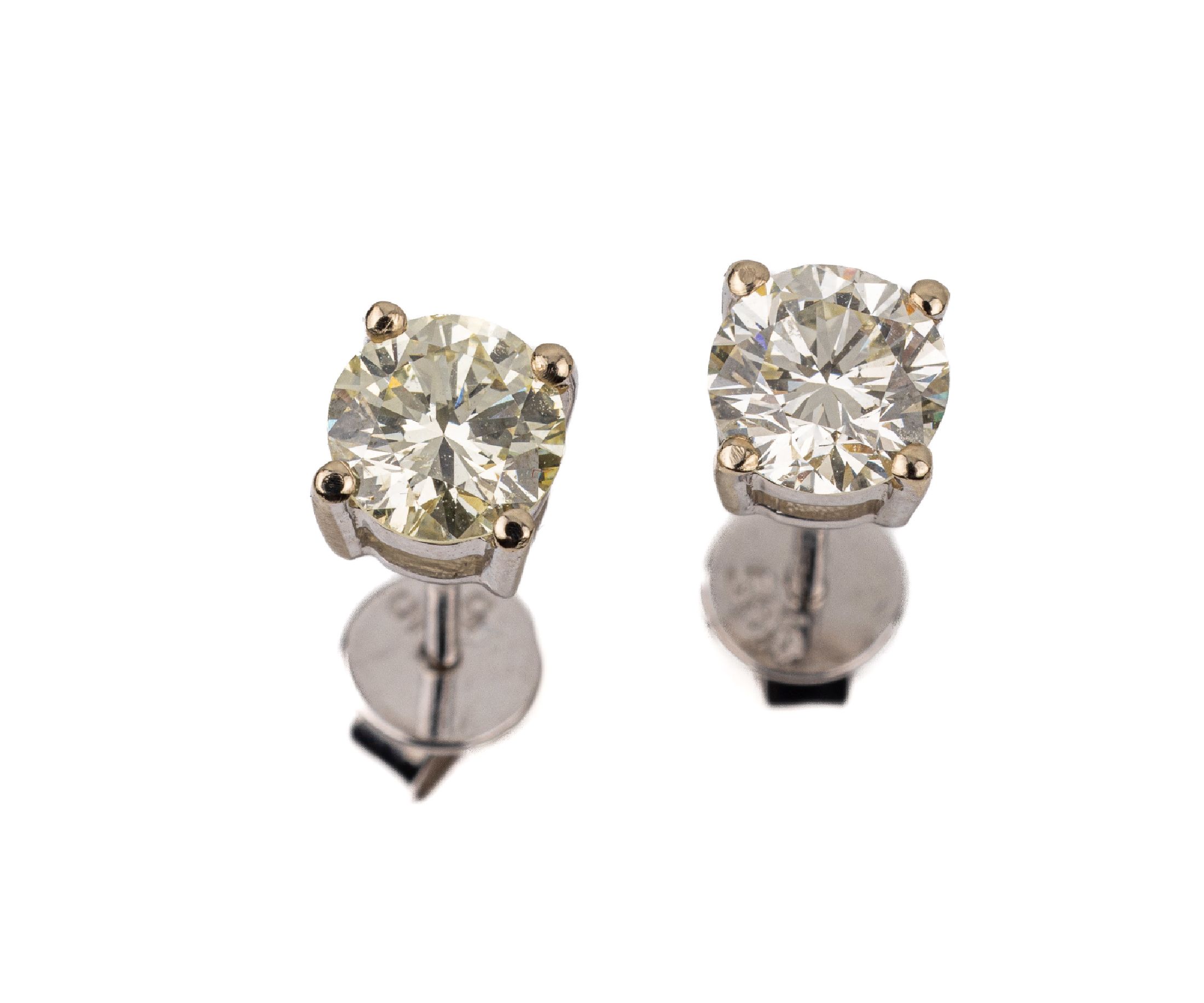 Paar 14 kt Gold Brillant-Ohrstecker, WG 585/00, 2 Brillanten zus. ca. 1.0 ct get.Weiß/si