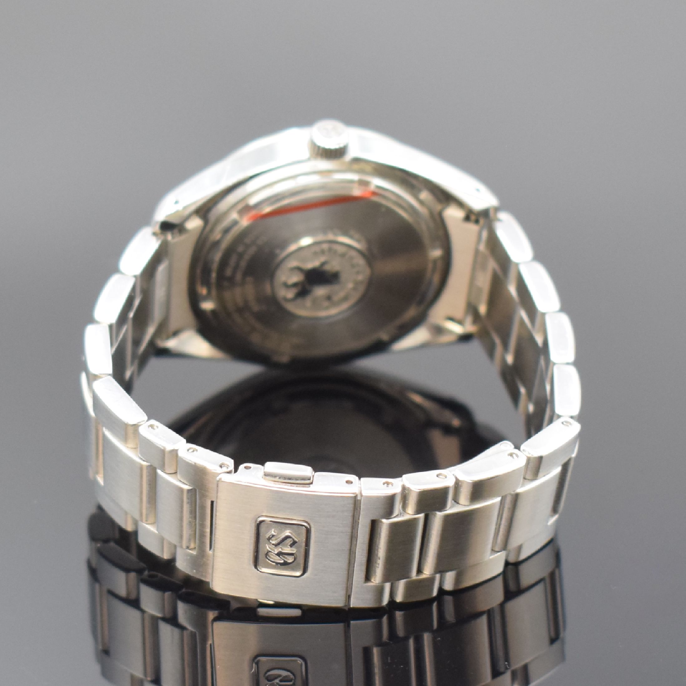 Detail b: GRAND SEIKO Herrenarmbanduhr Heritage Quartz Referenz 9F85-OACO, Japan um 2020, Edelstahlgeh. inkl. Gliederband m. Faltschl., Boden verschr., silb. ...