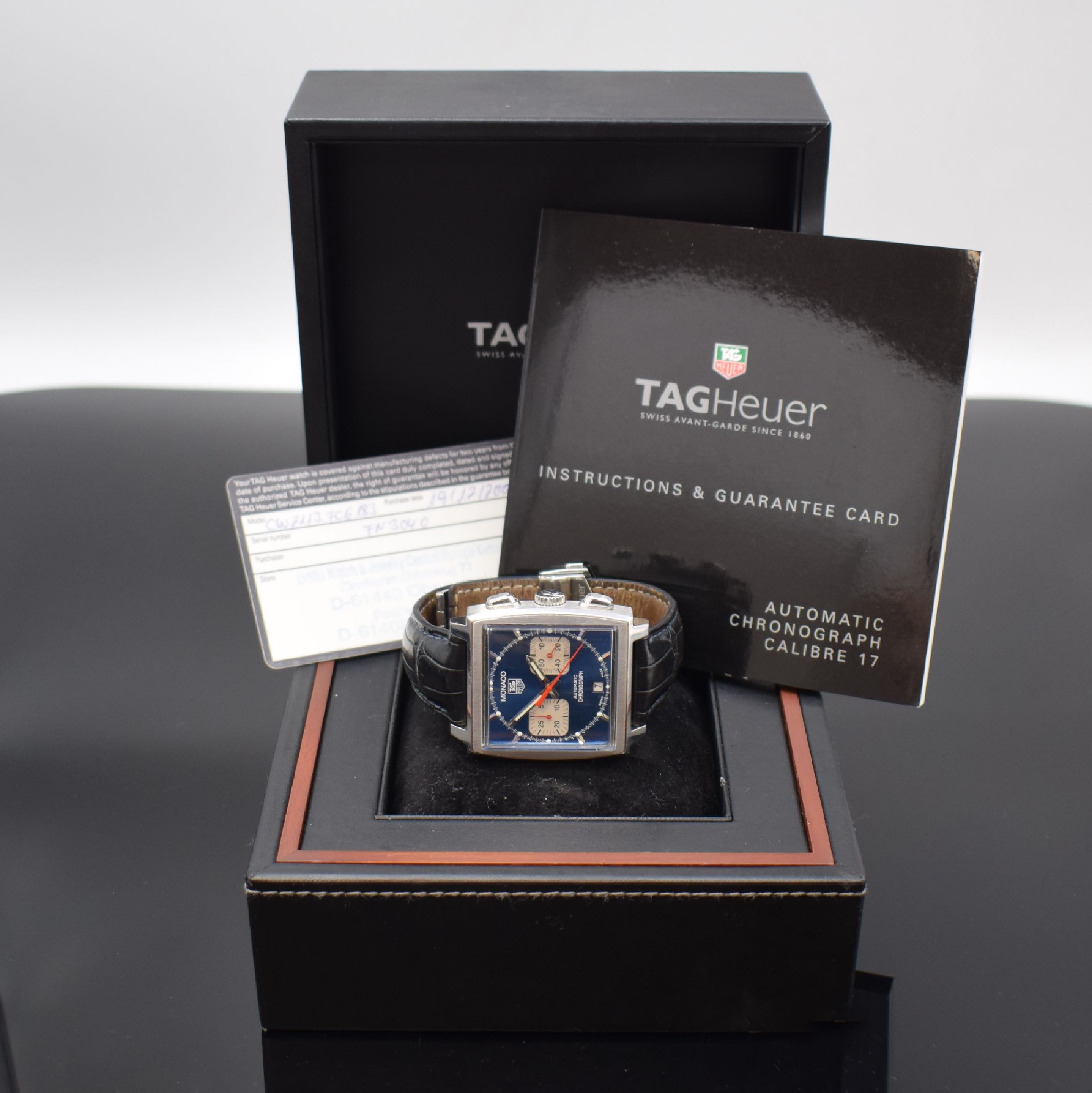 Detail e: TAG HEUER Monaco Herrenarmbanduhr mit Chronograph Ref. CW2113-0, Schweiz um 2007, Automatik, quadrat. Gehäuse, Boden 4-fach verschr., orig. ...