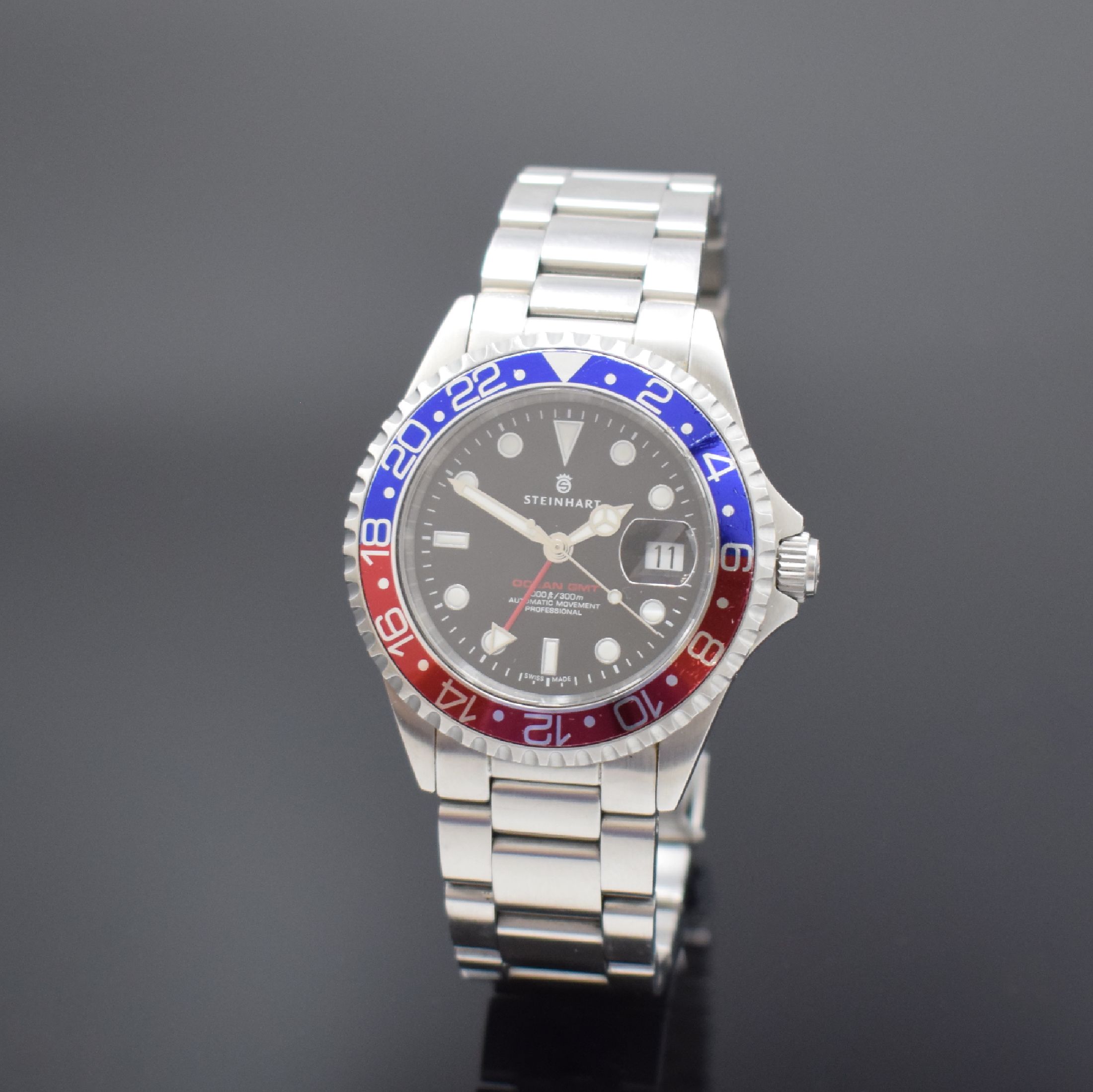STEINHART Ocean GMT 300M Herrenarmbanduhr, Schweiz um 2016, Automatik, verschr. Gehäuse in Edelstahl inkl. orig. Gliederband m. Faltschl., schwarzes ...
