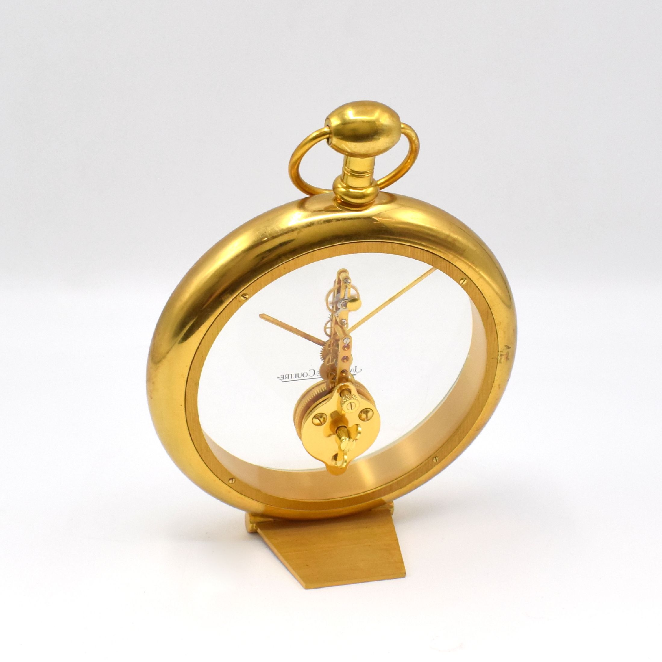 Detail c: Jaeger-LeCoultre kleine Tischuhr mit 8-Tage Stabwerk, Schweiz um 1980, rundes Geh. verg., auf rückseitigem Plexiglas montiertes verg. Werk Kal. 250, ...