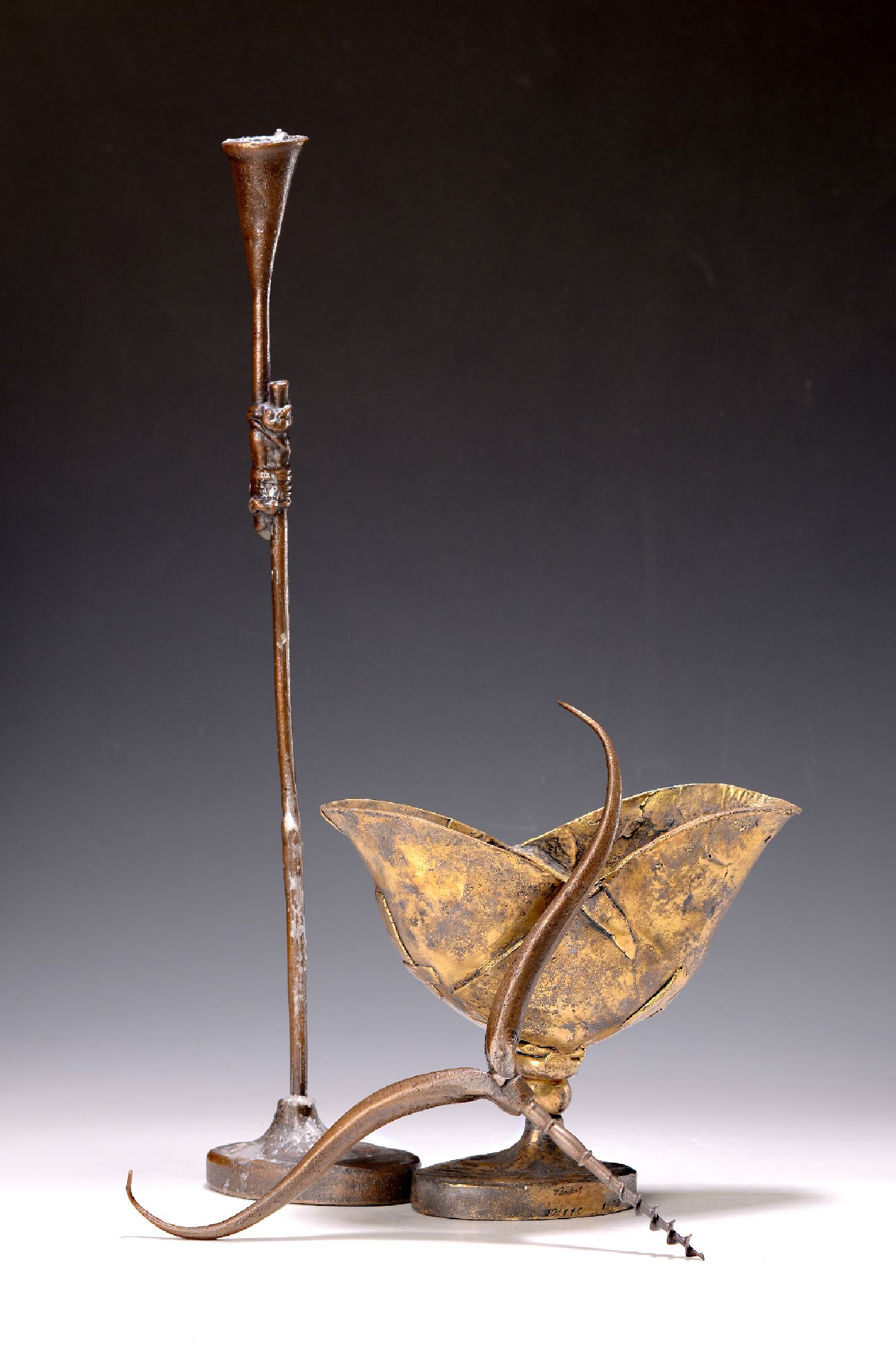 Paul Wunderlich, 1927-2010, drei Bronzen, Kelchgefäß, dat. 1979, signiert, num. 50/110, H. ca. 17cm; Korkenzieher, num. 876/1000, ca. 19x21cm; ...